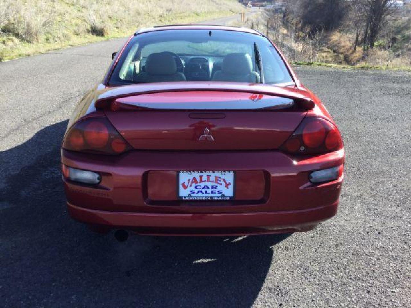 2000 Patriot Red Pearl /Beige Leather Mitsubishi Eclipse GT (4A3AC54L2YE) with an 3.0L V6 SOHC 24V engine, 4-Speed Automatic transmission, located at 1801 Main Street, Lewiston, 83501, (208) 743-9371, 46.417065, -117.004799 - Photo#8