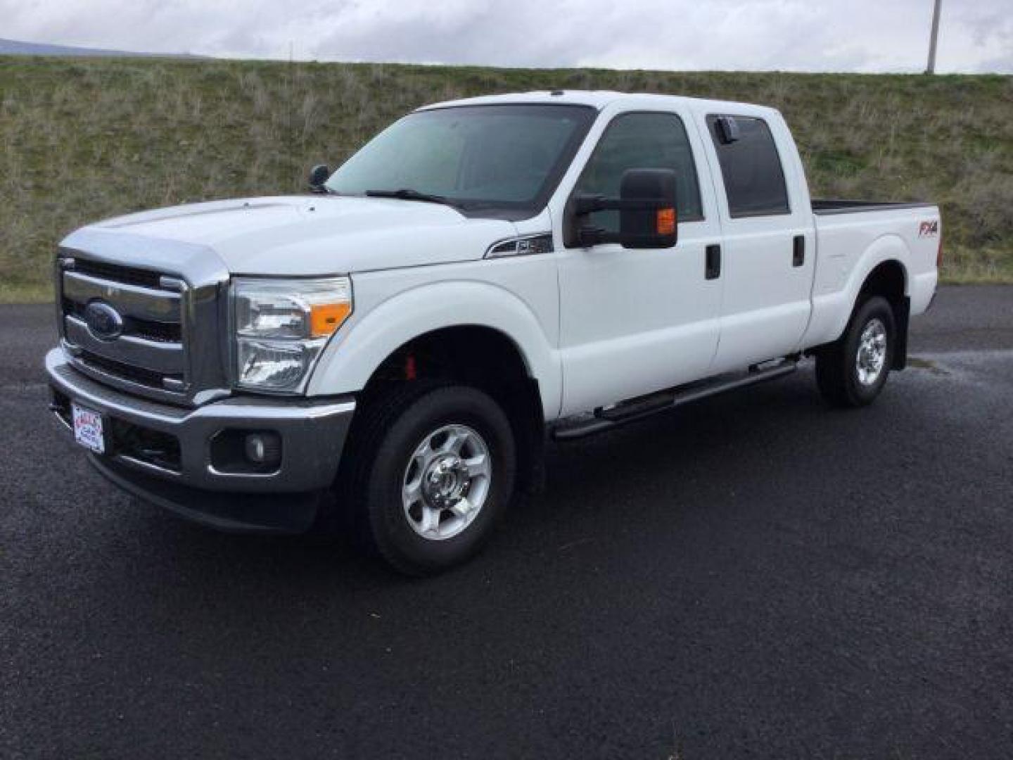 2013 Oxford White /Steel Cloth Interior Ford F-250 SD XLT Crew Cab 4WD (1FT7W2B6XDE) with an 6.2L V8 OHV 16V engine, 6-Speed Automatic transmission, located at 1801 Main Street, Lewiston, 83501, (208) 743-9371, 46.417065, -117.004799 - Photo#0