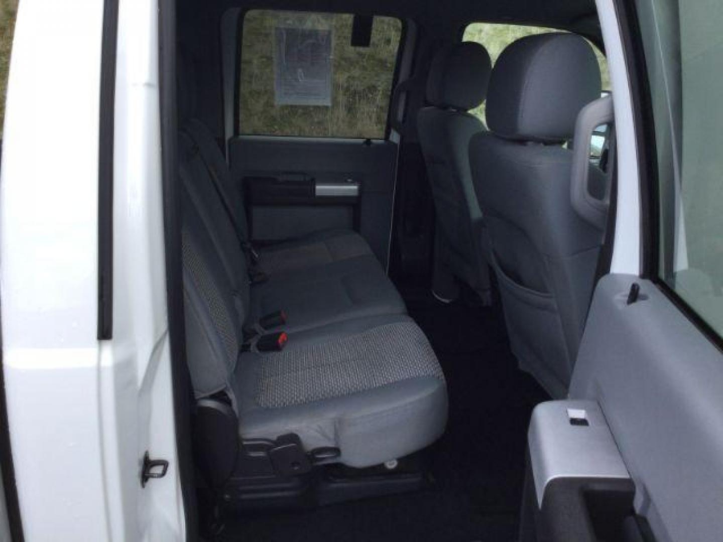 2013 Oxford White /Steel Cloth Interior Ford F-250 SD XLT Crew Cab 4WD (1FT7W2B6XDE) with an 6.2L V8 OHV 16V engine, 6-Speed Automatic transmission, located at 1801 Main Street, Lewiston, 83501, (208) 743-9371, 46.417065, -117.004799 - Photo#14