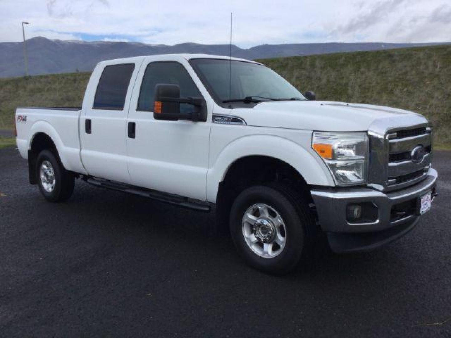 2013 Oxford White /Steel Cloth Interior Ford F-250 SD XLT Crew Cab 4WD (1FT7W2B6XDE) with an 6.2L V8 OHV 16V engine, 6-Speed Automatic transmission, located at 1801 Main Street, Lewiston, 83501, (208) 743-9371, 46.417065, -117.004799 - Photo#18