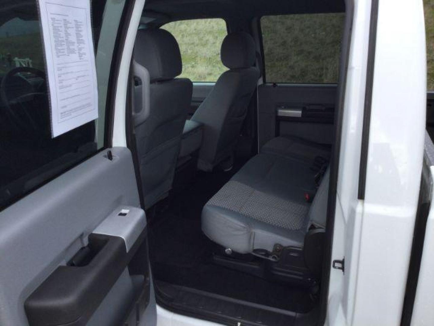 2013 Oxford White /Steel Cloth Interior Ford F-250 SD XLT Crew Cab 4WD (1FT7W2B6XDE) with an 6.2L V8 OHV 16V engine, 6-Speed Automatic transmission, located at 1801 Main Street, Lewiston, 83501, (208) 743-9371, 46.417065, -117.004799 - Photo#4