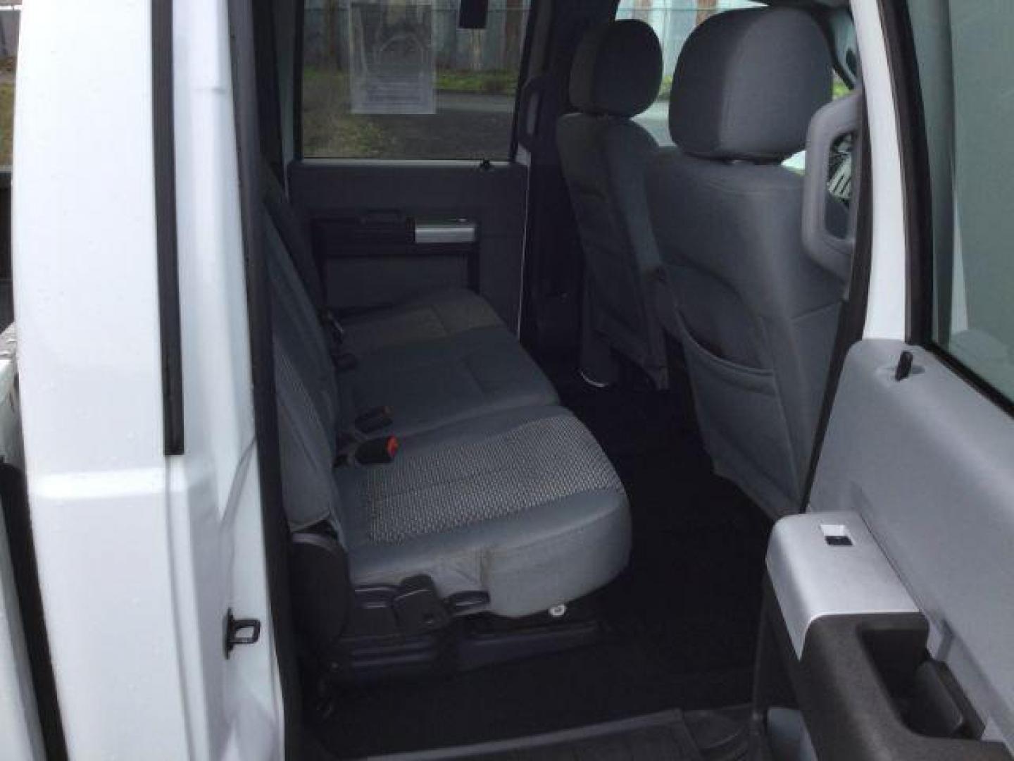 2013 Oxford White /Steel Cloth Interior Ford F-250 SD XLT Crew Cab 4WD (1FT7W2B6XDE) with an 6.2L V8 OHV 16V engine, 6-Speed Automatic transmission, located at 1801 Main Street, Lewiston, 83501, (208) 743-9371, 46.417065, -117.004799 - Photo#7