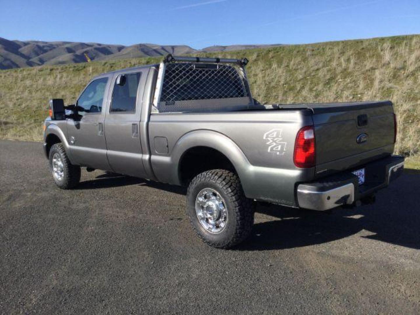 2014 Sterling Gray Metallic /Steel Ford F-350 SD XLT Crew Cab 4WD (1FT8W3BT3EE) with an 6.7L V8 OHV 16V DIESEL engine, 6-Speed Automatic transmission, located at 1801 Main Street, Lewiston, 83501, (208) 743-9371, 46.417065, -117.004799 - Photo#2