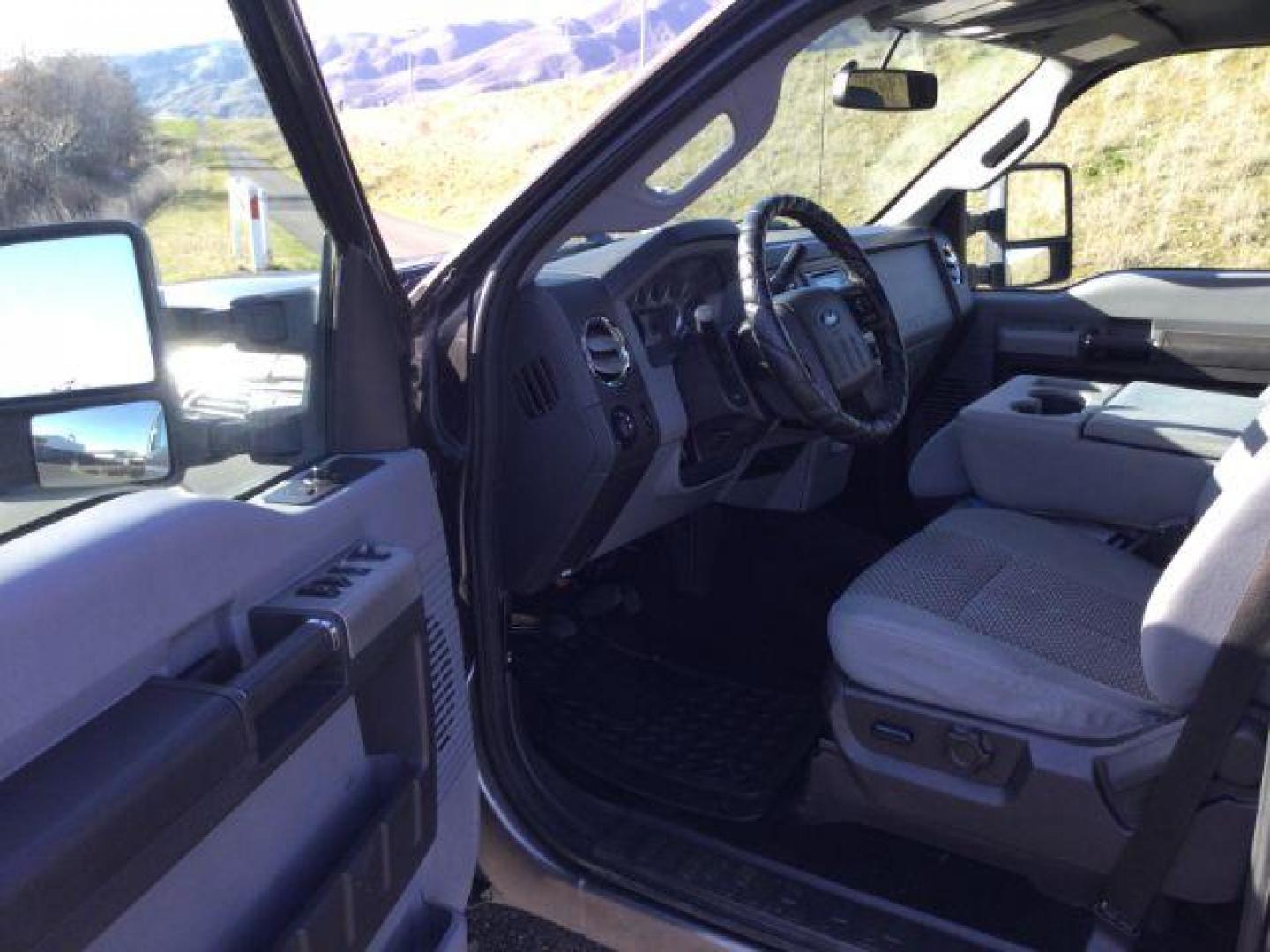 2014 Sterling Gray Metallic /Steel Ford F-350 SD XLT Crew Cab 4WD (1FT8W3BT3EE) with an 6.7L V8 OHV 16V DIESEL engine, 6-Speed Automatic transmission, located at 1801 Main Street, Lewiston, 83501, (208) 743-9371, 46.417065, -117.004799 - Photo#3