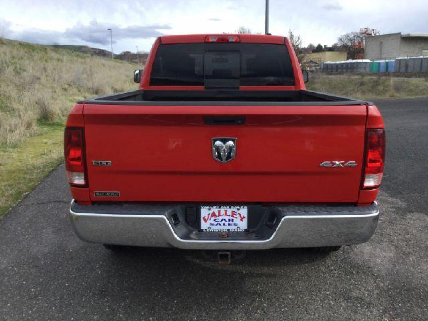 2011 Flame Red /Dark Slate/Medium Graystone Cloth Interior RAM 1500 SLT Quad Cab 4WD (1D7RV1GT9BS) with an 5.7L V8 OHV 16V engine, 5-Speed Automatic transmission, located at 1801 Main Street, Lewiston, 83501, (208) 743-9371, 46.417065, -117.004799 - Photo#12