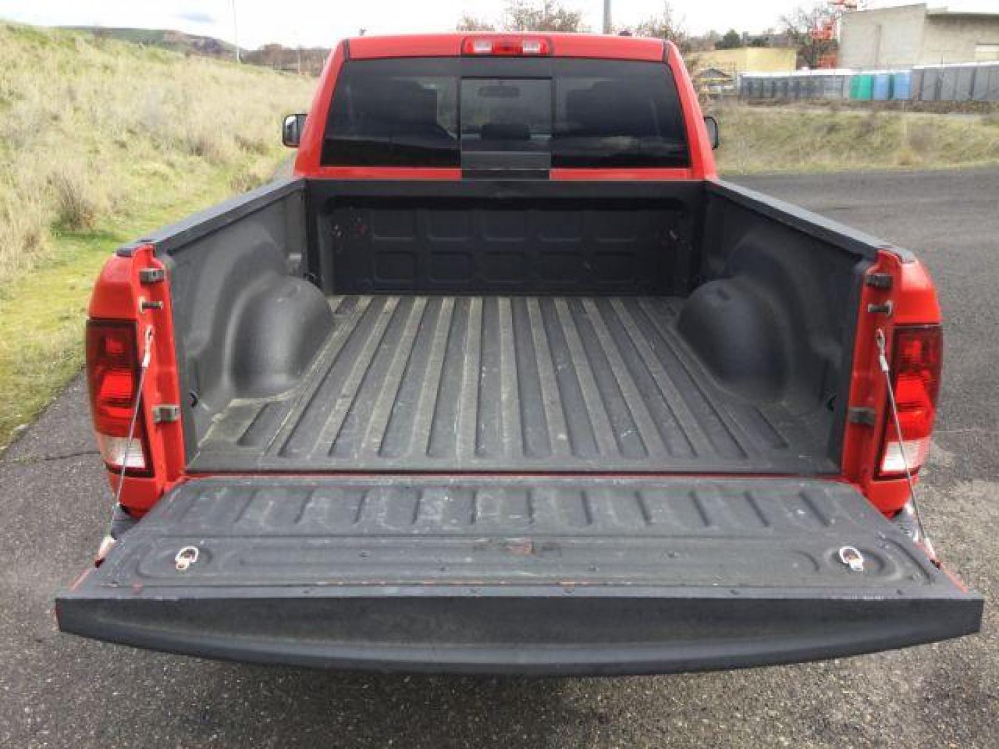 2011 Flame Red /Dark Slate/Medium Graystone Cloth Interior RAM 1500 SLT Quad Cab 4WD (1D7RV1GT9BS) with an 5.7L V8 OHV 16V engine, 5-Speed Automatic transmission, located at 1801 Main Street, Lewiston, 83501, (208) 743-9371, 46.417065, -117.004799 - Photo#13