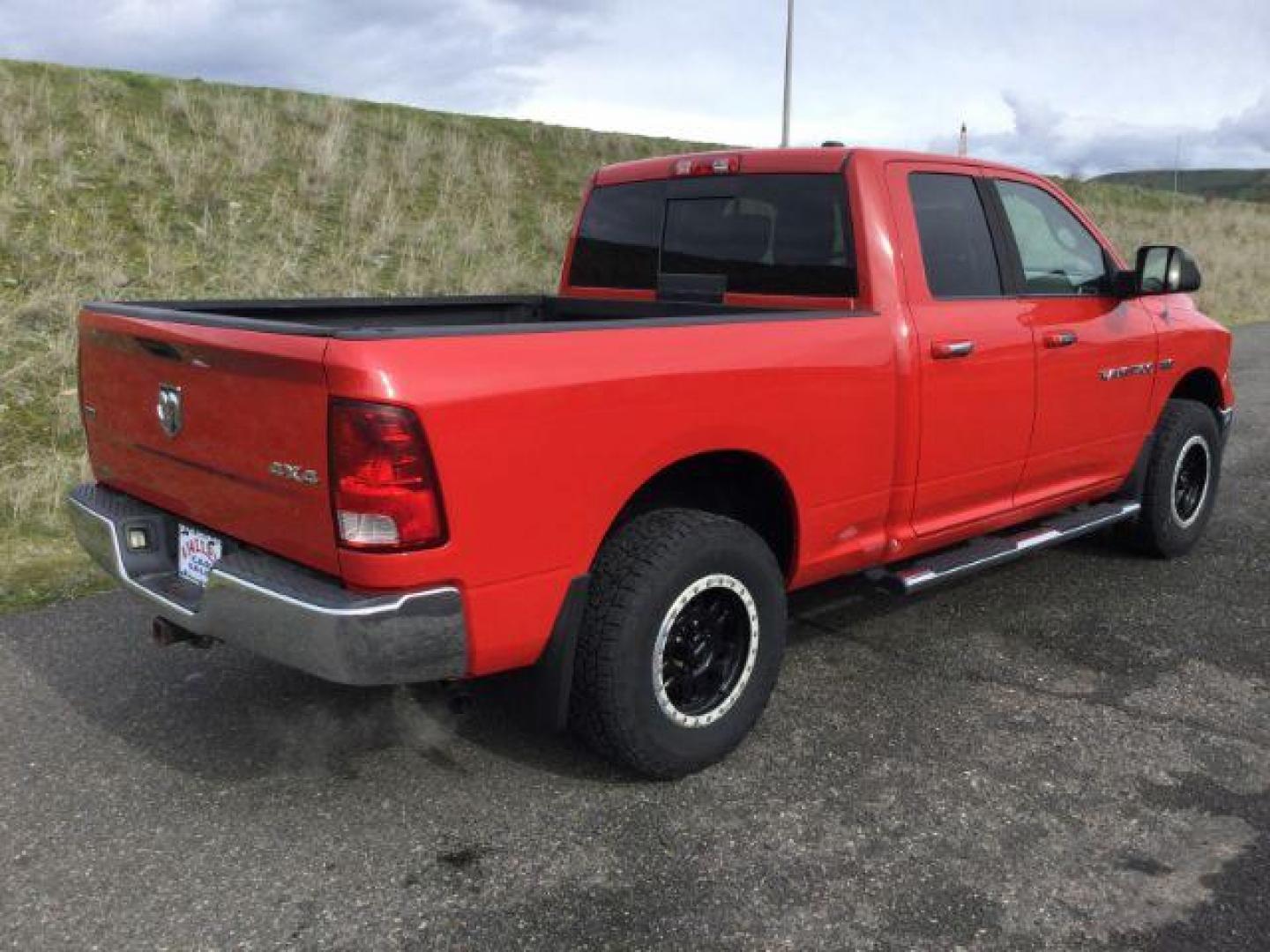 2011 Flame Red /Dark Slate/Medium Graystone Cloth Interior RAM 1500 SLT Quad Cab 4WD (1D7RV1GT9BS) with an 5.7L V8 OHV 16V engine, 5-Speed Automatic transmission, located at 1801 Main Street, Lewiston, 83501, (208) 743-9371, 46.417065, -117.004799 - Photo#14