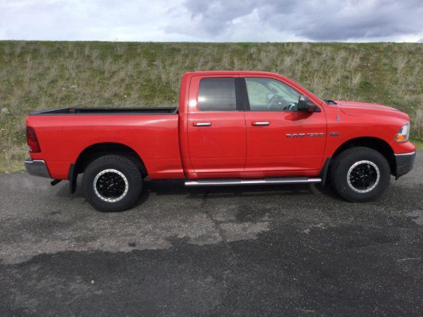 2011 Flame Red /Dark Slate/Medium Graystone Cloth Interior RAM 1500 SLT Quad Cab 4WD (1D7RV1GT9BS) with an 5.7L V8 OHV 16V engine, 5-Speed Automatic transmission, located at 1801 Main Street, Lewiston, 83501, (208) 743-9371, 46.417065, -117.004799 - Photo#15