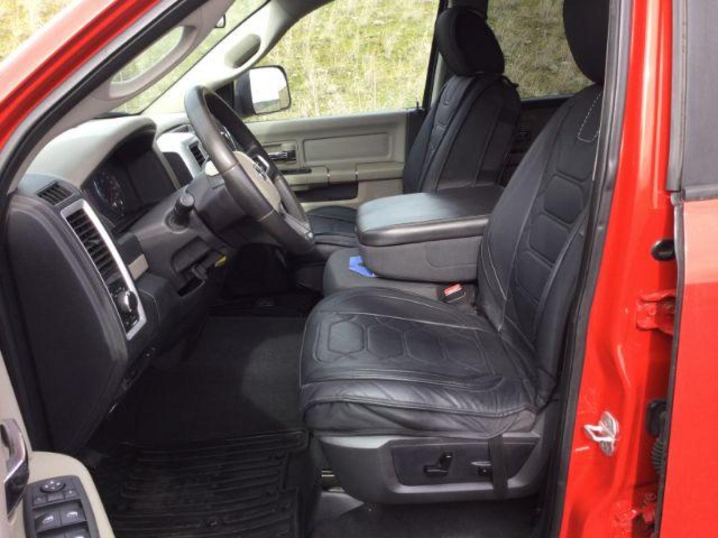 2011 Flame Red /Dark Slate/Medium Graystone Cloth Interior RAM 1500 SLT Quad Cab 4WD (1D7RV1GT9BS) with an 5.7L V8 OHV 16V engine, 5-Speed Automatic transmission, located at 1801 Main Street, Lewiston, 83501, (208) 743-9371, 46.417065, -117.004799 - Photo#4