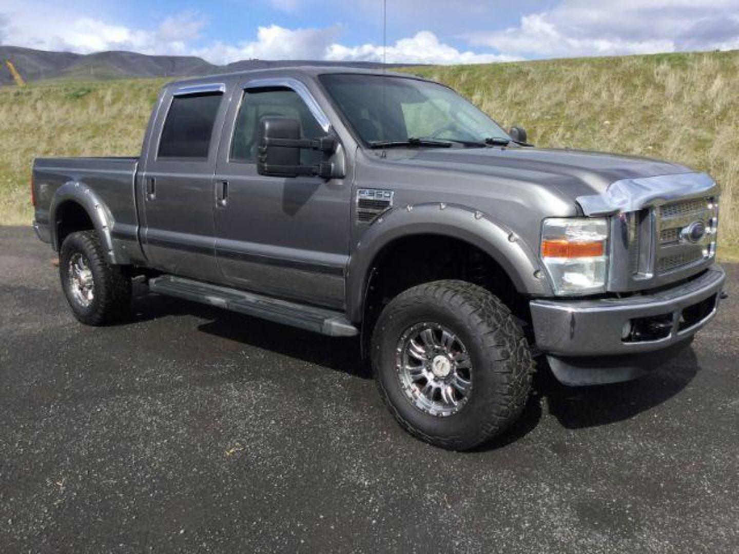 2010 Sterling Grey Metallic /Ebony Leather Interior Ford F-350 SD Lariat Crew Cab 4WD (1FTWW3BY5AE) with an 6.8L V10 SOHC 30V engine, 5-Speed Automatic transmission, located at 1801 Main Street, Lewiston, 83501, (208) 743-9371, 46.417065, -117.004799 - Photo#10