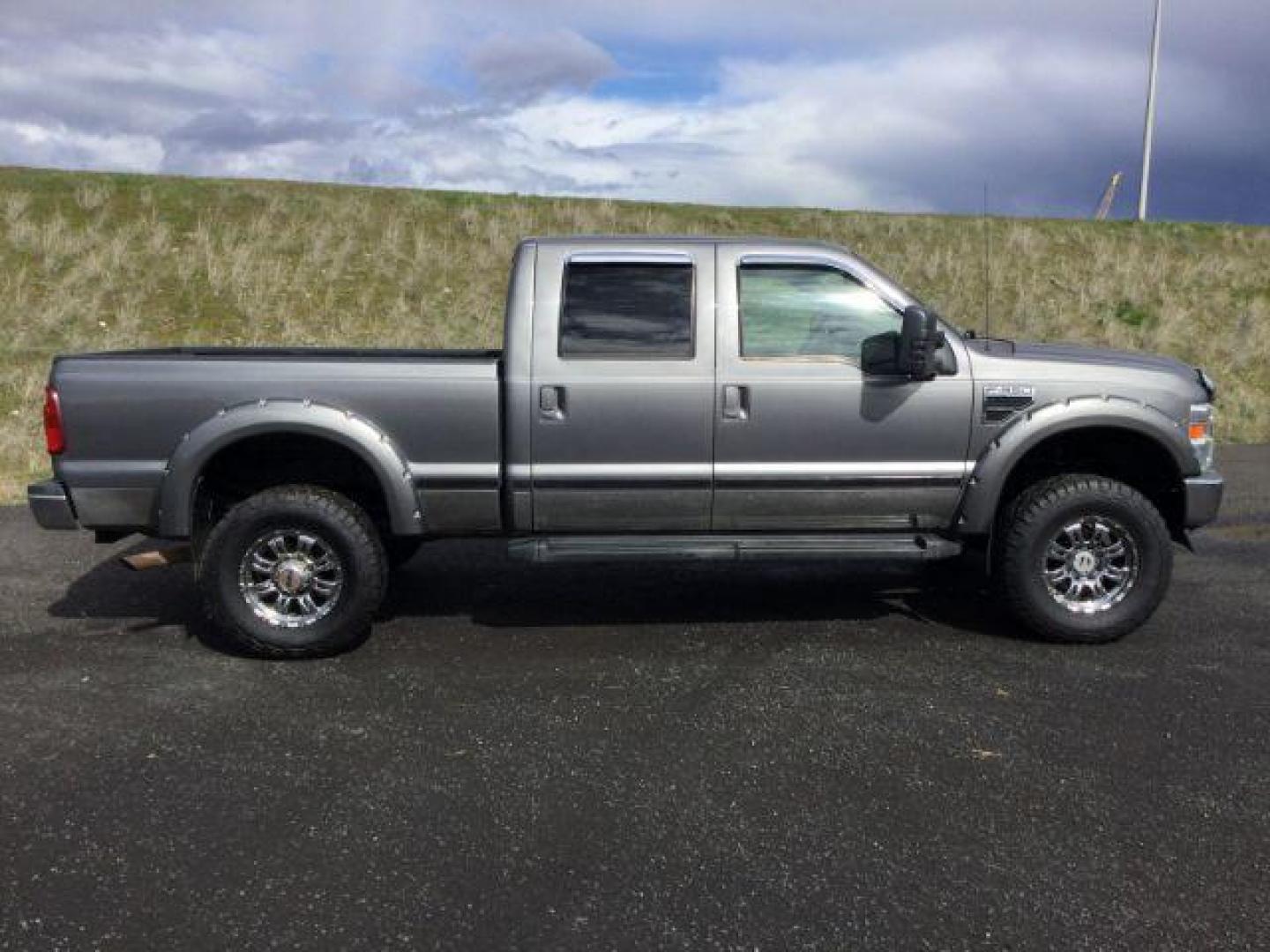 2010 Sterling Grey Metallic /Ebony Leather Interior Ford F-350 SD Lariat Crew Cab 4WD (1FTWW3BY5AE) with an 6.8L V10 SOHC 30V engine, 5-Speed Automatic transmission, located at 1801 Main Street, Lewiston, 83501, (208) 743-9371, 46.417065, -117.004799 - Photo#11