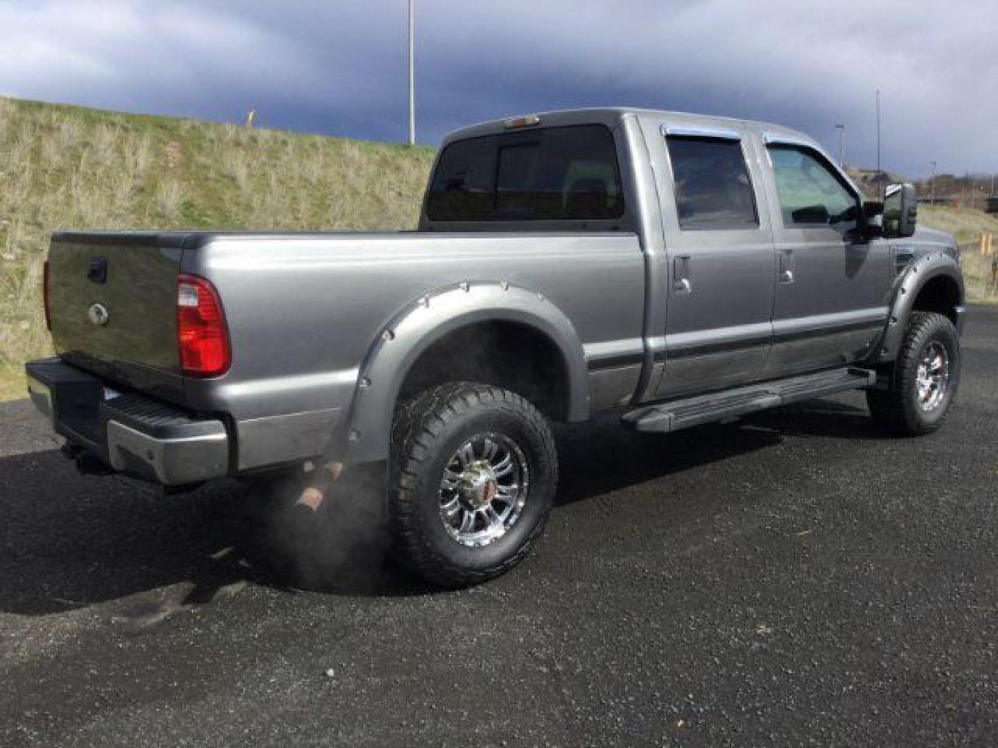 2010 Sterling Grey Metallic /Ebony Leather Interior Ford F-350 SD Lariat Crew Cab 4WD (1FTWW3BY5AE) with an 6.8L V10 SOHC 30V engine, 5-Speed Automatic transmission, located at 1801 Main Street, Lewiston, 83501, (208) 743-9371, 46.417065, -117.004799 - Photo#12