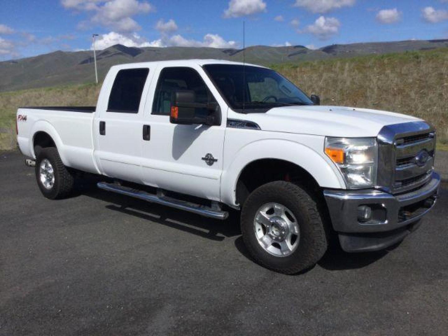 2013 Oxford White /Steel Cloth Interior Ford F-350 SD XLT Crew Cab Long Bed 4WD (1FT8W3BT1DE) with an 6.7L V8 OHV 16V DIESEL engine, 6-Speed Automatic transmission, located at 1801 Main Street, Lewiston, 83501, (208) 743-9371, 46.417065, -117.004799 - Photo#9