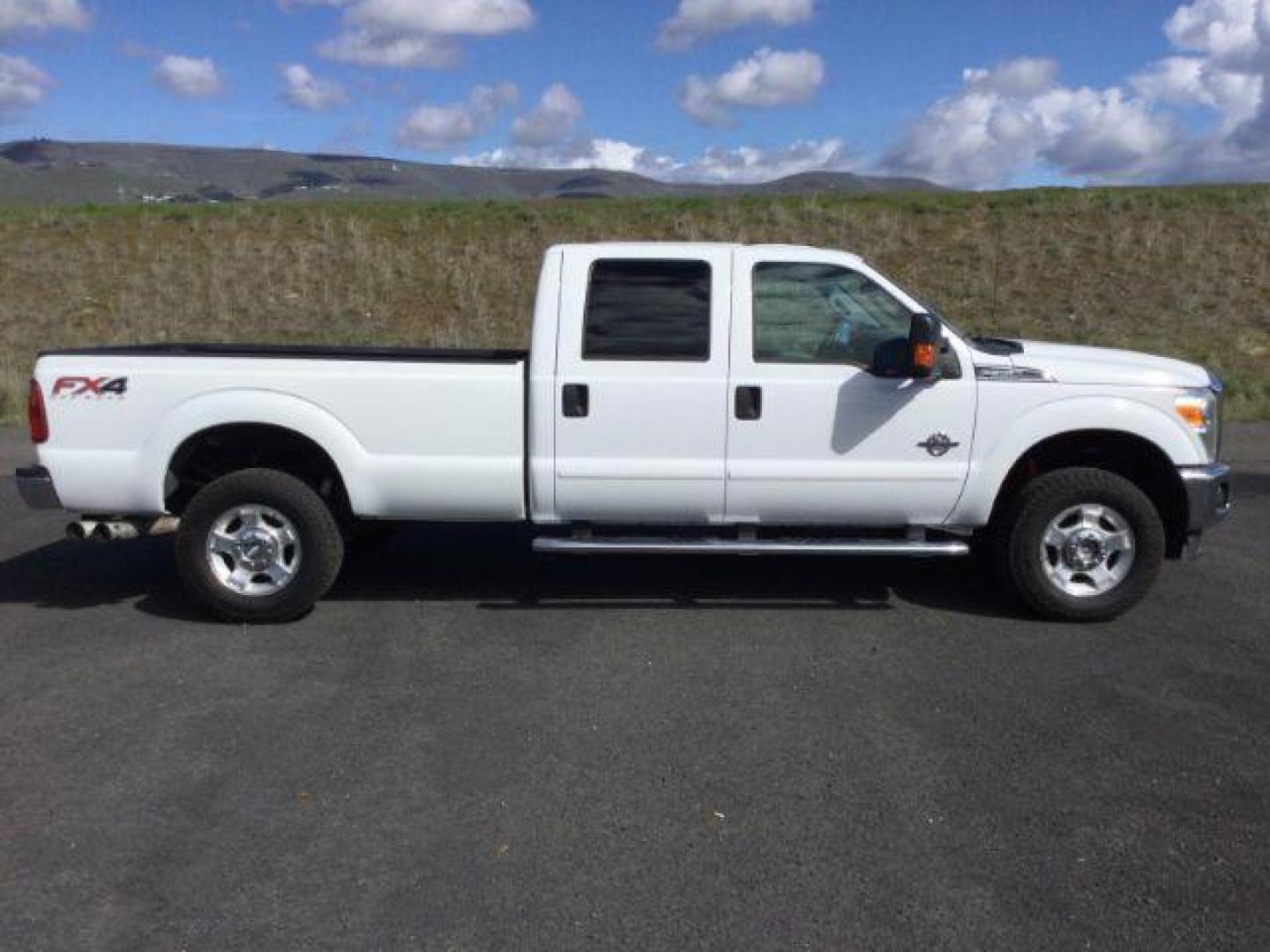 2013 Oxford White /Steel Cloth Interior Ford F-350 SD XLT Crew Cab Long Bed 4WD (1FT8W3BT1DE) with an 6.7L V8 OHV 16V DIESEL engine, 6-Speed Automatic transmission, located at 1801 Main Street, Lewiston, 83501, (208) 743-9371, 46.417065, -117.004799 - Photo#10