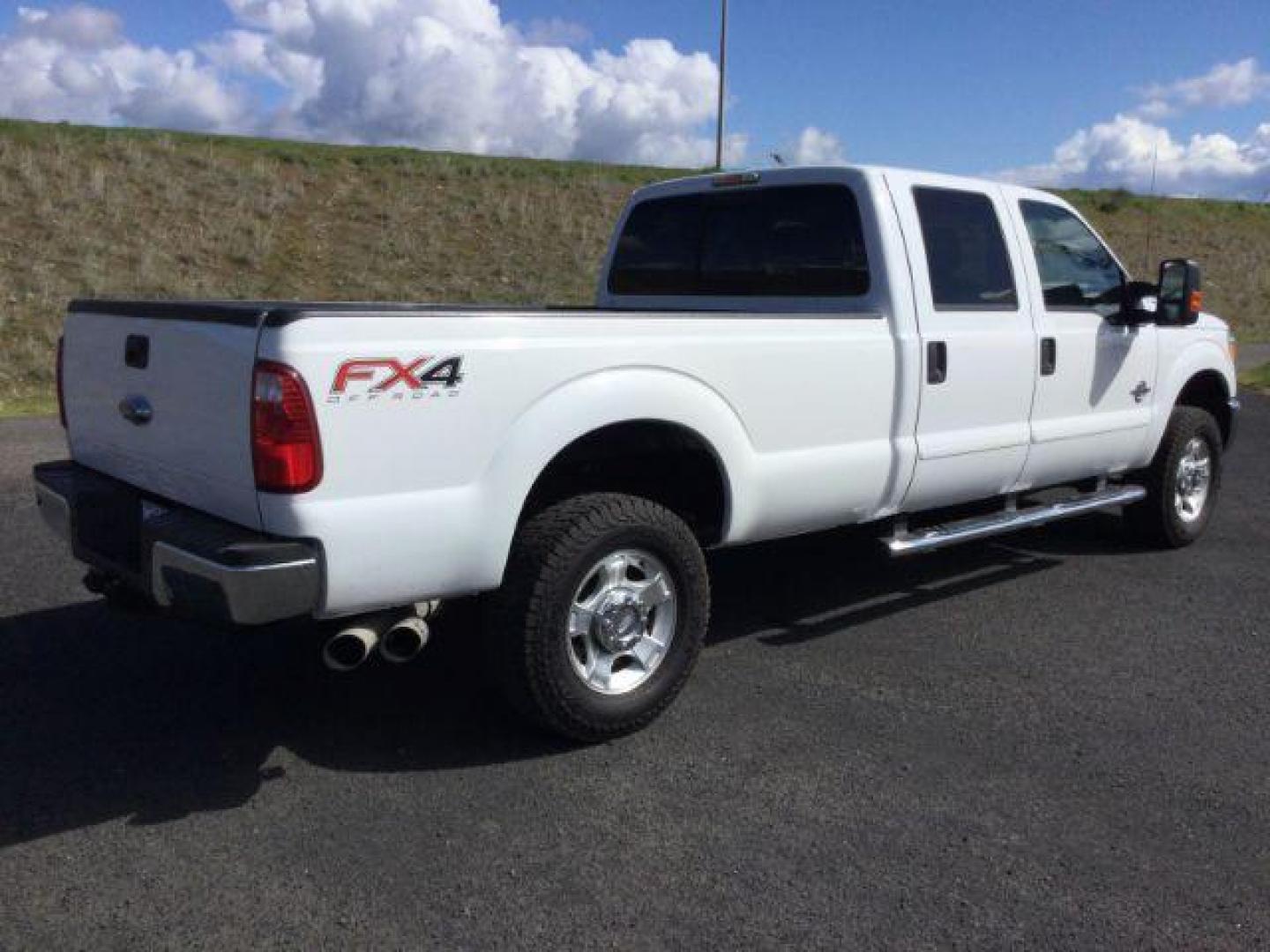 2013 Oxford White /Steel Cloth Interior Ford F-350 SD XLT Crew Cab Long Bed 4WD (1FT8W3BT1DE) with an 6.7L V8 OHV 16V DIESEL engine, 6-Speed Automatic transmission, located at 1801 Main Street, Lewiston, 83501, (208) 743-9371, 46.417065, -117.004799 - Photo#11