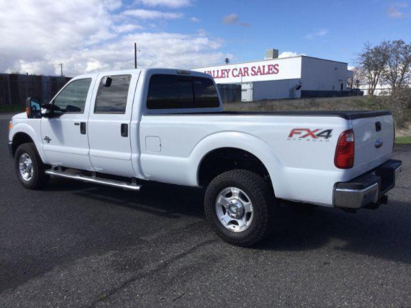 2013 Oxford White /Steel Cloth Interior Ford F-350 SD XLT Crew Cab Long Bed 4WD (1FT8W3BT1DE) with an 6.7L V8 OHV 16V DIESEL engine, 6-Speed Automatic transmission, located at 1801 Main Street, Lewiston, 83501, (208) 743-9371, 46.417065, -117.004799 - Photo#2