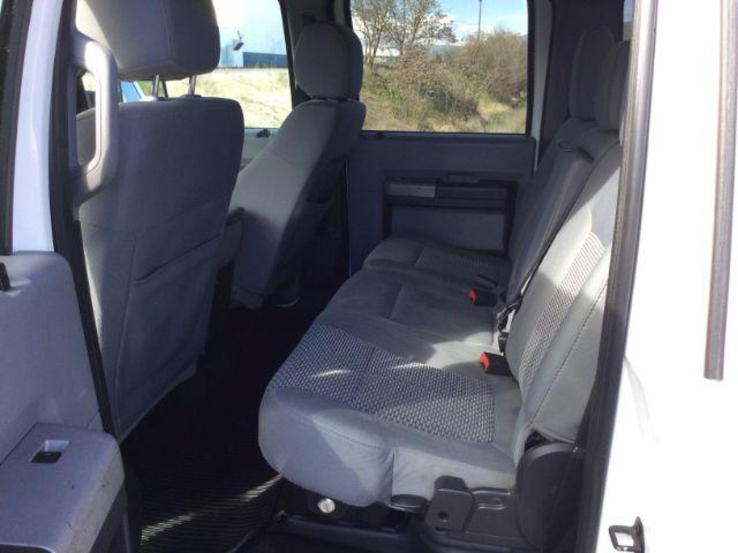 2013 Oxford White /Steel Cloth Interior Ford F-350 SD XLT Crew Cab Long Bed 4WD (1FT8W3BT1DE) with an 6.7L V8 OHV 16V DIESEL engine, 6-Speed Automatic transmission, located at 1801 Main Street, Lewiston, 83501, (208) 743-9371, 46.417065, -117.004799 - Photo#5