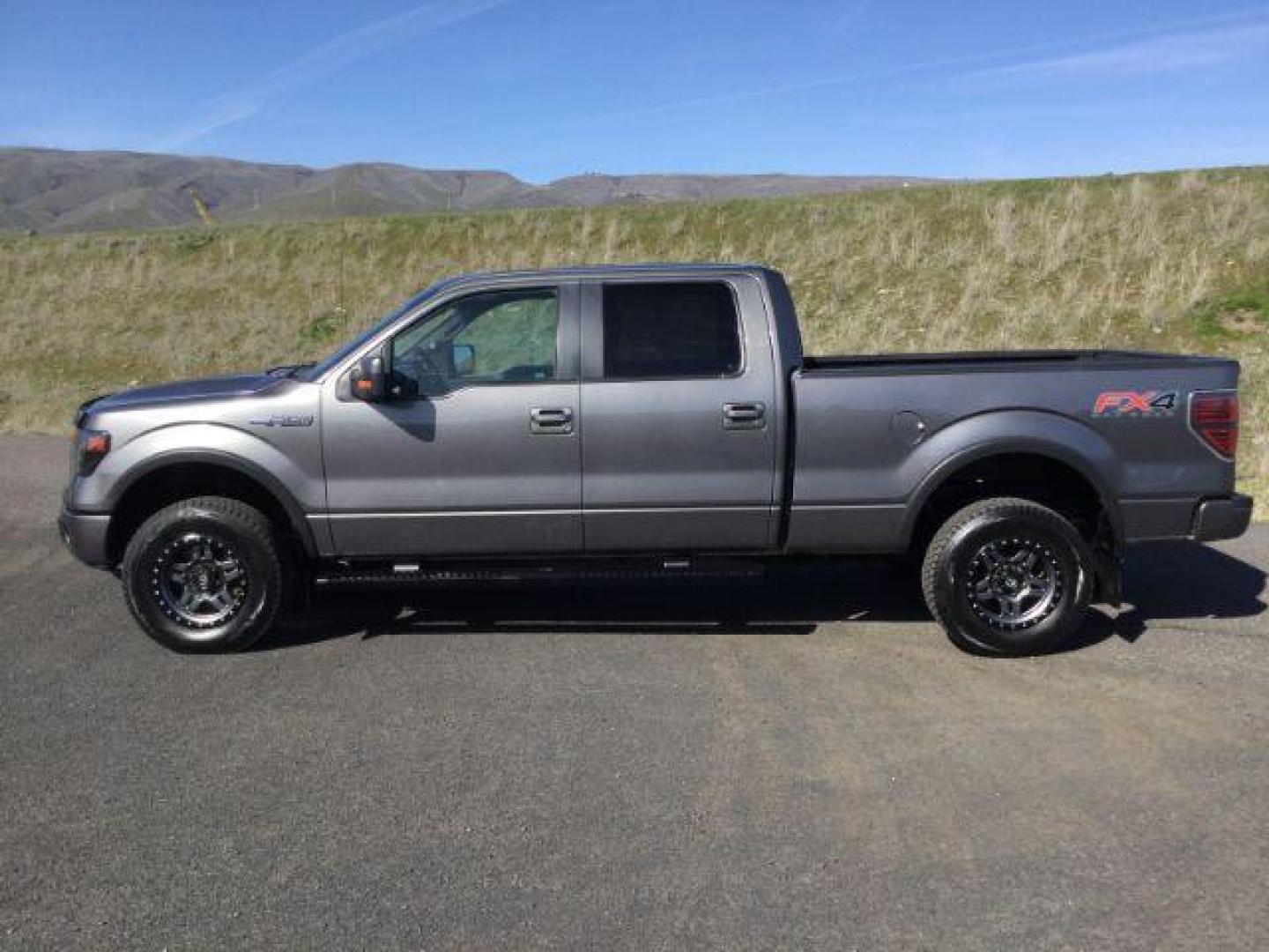 2013 GRAY /BLACK LEATHER Ford F-150 FX4 SuperCrew 6.5-ft. Bed 4WD (1FTFW1EF1DF) with an 5.0L V8 engine, 6-Speed Automatic transmission, located at 1801 Main Street, Lewiston, 83501, (208) 743-9371, 46.417065, -117.004799 - Photo#1