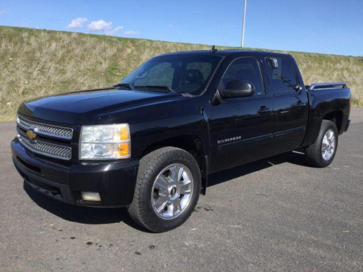 2012 Black /Ebony Leather Interior Chevrolet Silverado 1500 LTZ Crew Cab 4WD (3GCPKTE72CG) with an 5.3L V8 OHV 16V FFV engine, 6-Speed Automatic transmission, located at 1801 Main Street, Lewiston, 83501, (208) 743-9371, 46.417065, -117.004799 - Photo#0