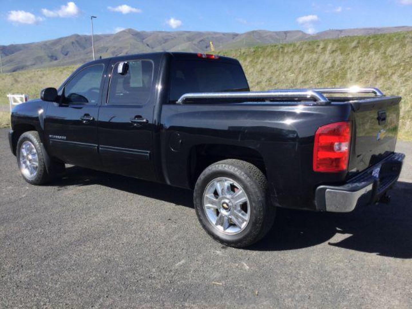 2012 Black /Ebony Leather Interior Chevrolet Silverado 1500 LTZ Crew Cab 4WD (3GCPKTE72CG) with an 5.3L V8 OHV 16V FFV engine, 6-Speed Automatic transmission, located at 1801 Main Street, Lewiston, 83501, (208) 743-9371, 46.417065, -117.004799 - Photo#2