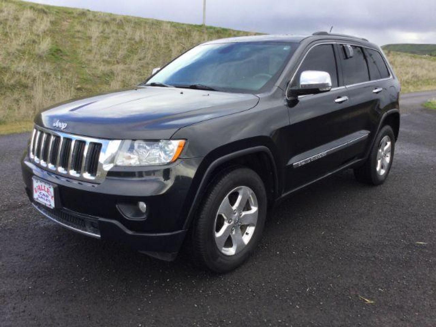 2013 Brilliant Black Crystal Pearl /Black Leather Interior Jeep Grand Cherokee Limited 4WD (1C4RJFBG3DC) with an 3.6L V6 DOHC 24V engine, 5-Speed Automatic transmission, located at 1801 Main Street, Lewiston, 83501, (208) 743-9371, 46.417065, -117.004799 - Photo#0