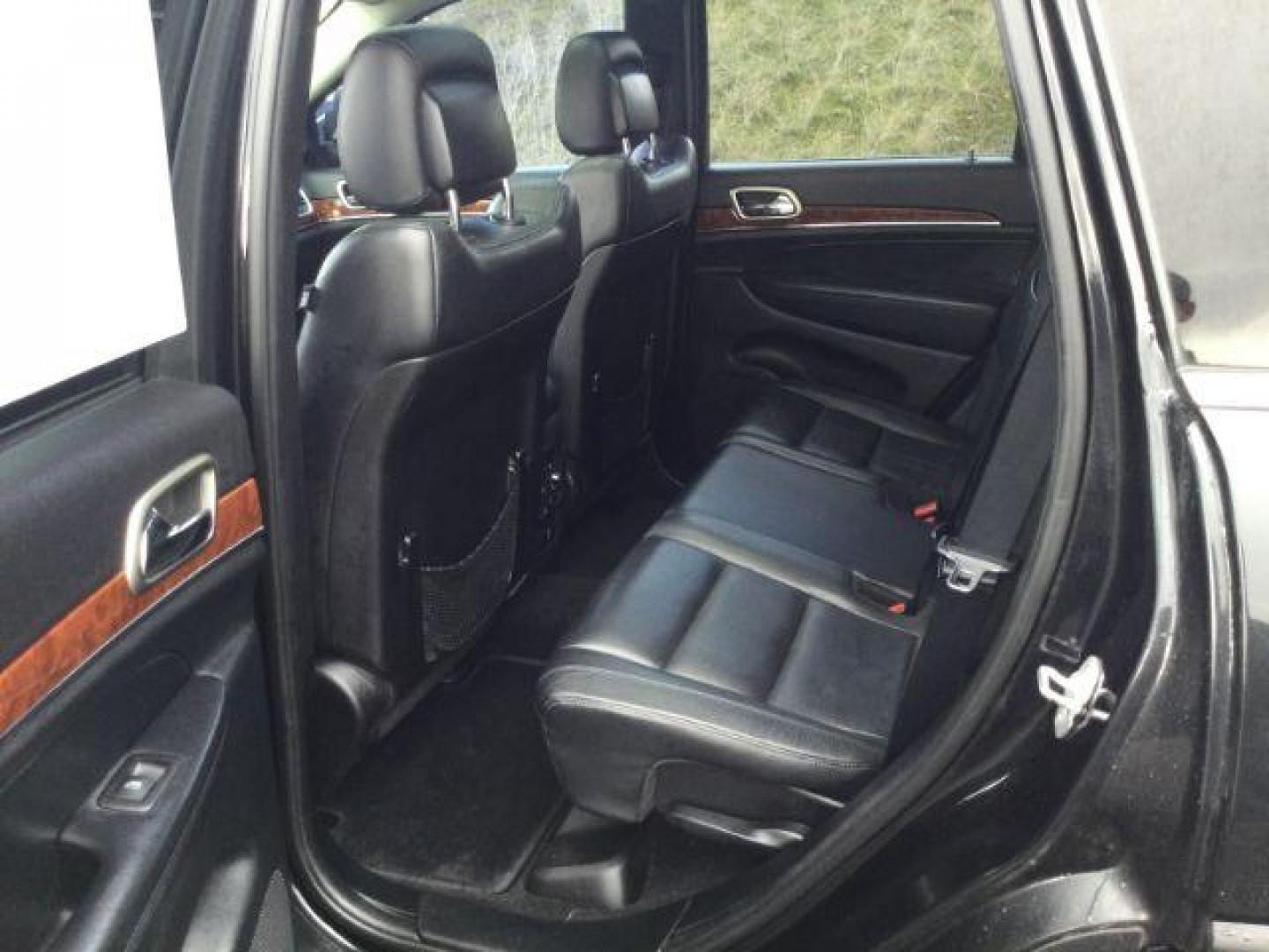 2013 Brilliant Black Crystal Pearl /Black Leather Interior Jeep Grand Cherokee Limited 4WD (1C4RJFBG3DC) with an 3.6L V6 DOHC 24V engine, 5-Speed Automatic transmission, located at 1801 Main Street, Lewiston, 83501, (208) 743-9371, 46.417065, -117.004799 - Photo#10