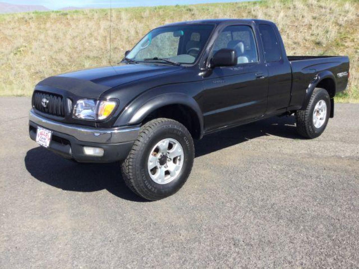 2002 Black Sand Pearl /GRAY CLOTH Toyota Tacoma Xtracab V6 4WD (5TEWN72N42Z) with an 3.4L V6 DOHC 24V engine, 5-Speed Manual transmission, located at 1801 Main Street, Lewiston, 83501, (208) 743-9371, 46.417065, -117.004799 - Photo#0