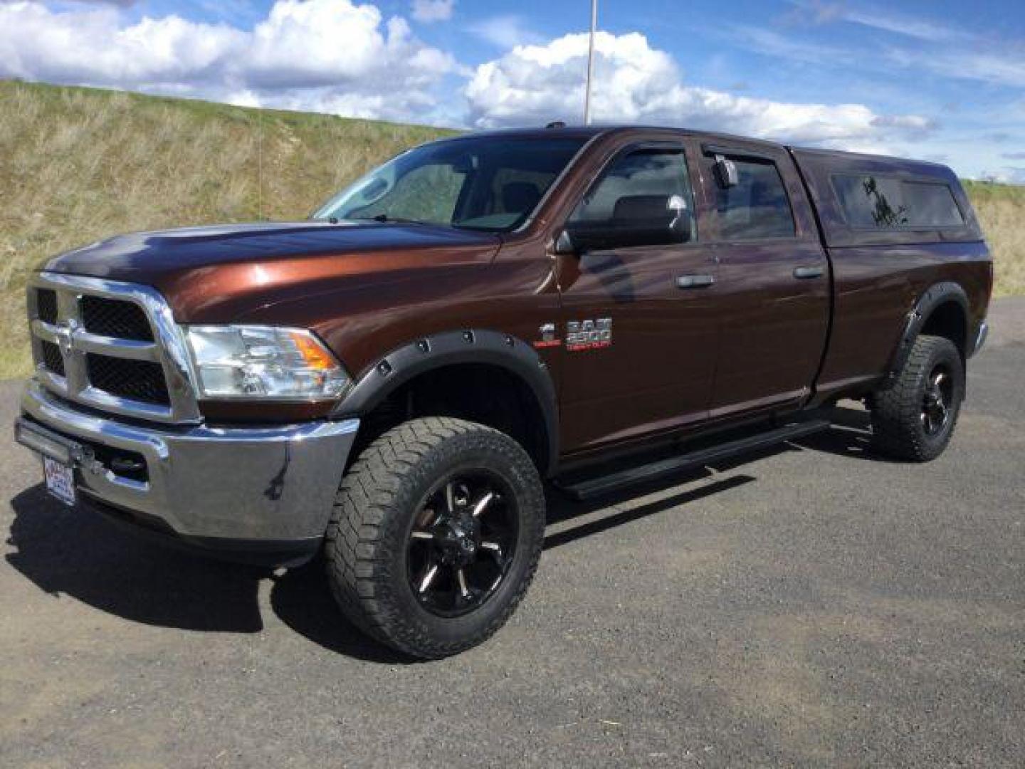 2015 Western Brown /GRAY CLOTH RAM 2500 Tradesman Crew Cab LWB 4WD (3C6UR5HL0FG) with an 6.7L L6 OHV 24V TURBO DIESEL engine, 6-Speed Manual Transmission transmission, located at 1801 Main Street, Lewiston, 83501, (208) 743-9371, 46.417065, -117.004799 - Photo#0