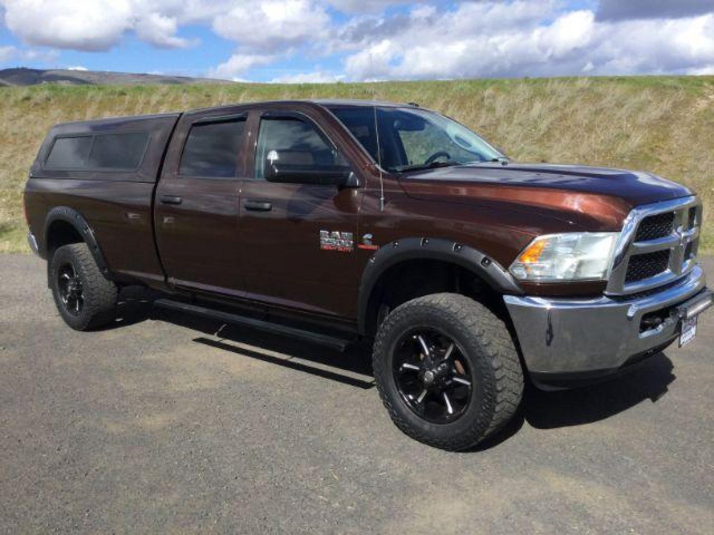 2015 Western Brown /GRAY CLOTH RAM 2500 Tradesman Crew Cab LWB 4WD (3C6UR5HL0FG) with an 6.7L L6 OHV 24V TURBO DIESEL engine, 6-Speed Manual Transmission transmission, located at 1801 Main Street, Lewiston, 83501, (208) 743-9371, 46.417065, -117.004799 - Photo#12