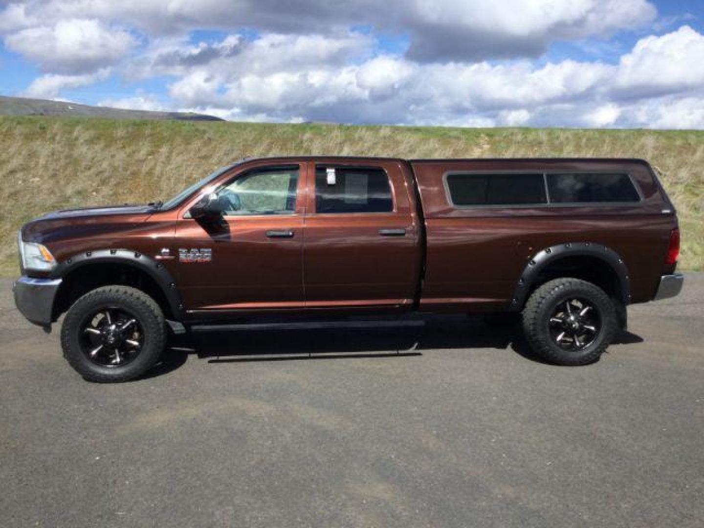 2015 Western Brown /GRAY CLOTH RAM 2500 Tradesman Crew Cab LWB 4WD (3C6UR5HL0FG) with an 6.7L L6 OHV 24V TURBO DIESEL engine, 6-Speed Manual Transmission transmission, located at 1801 Main Street, Lewiston, 83501, (208) 743-9371, 46.417065, -117.004799 - Photo#1