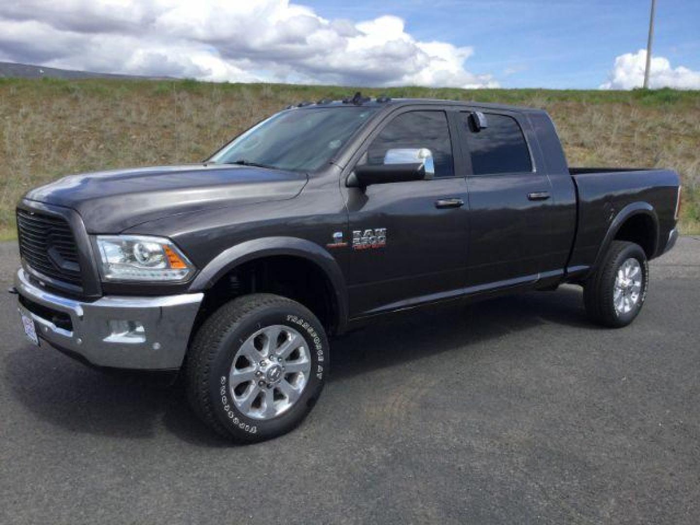 2017 Granite Crystal Metallic Clear Coat /Black, leather RAM 2500 Laramie Mega Cab 4WD (3C6UR5NL1HG) with an 6.7L L6 OHV 24V TURBO DIESEL engine, 6-Speed Automatic transmission, located at 1801 Main Street, Lewiston, 83501, (208) 743-9371, 46.417065, -117.004799 - Photo#0