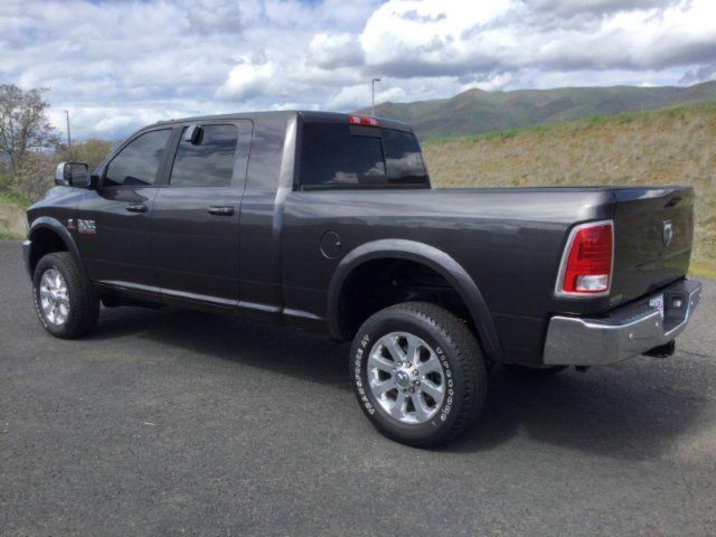 2017 Granite Crystal Metallic Clear Coat /Black, leather RAM 2500 Laramie Mega Cab 4WD (3C6UR5NL1HG) with an 6.7L L6 OHV 24V TURBO DIESEL engine, 6-Speed Automatic transmission, located at 1801 Main Street, Lewiston, 83501, (208) 743-9371, 46.417065, -117.004799 - Photo#2