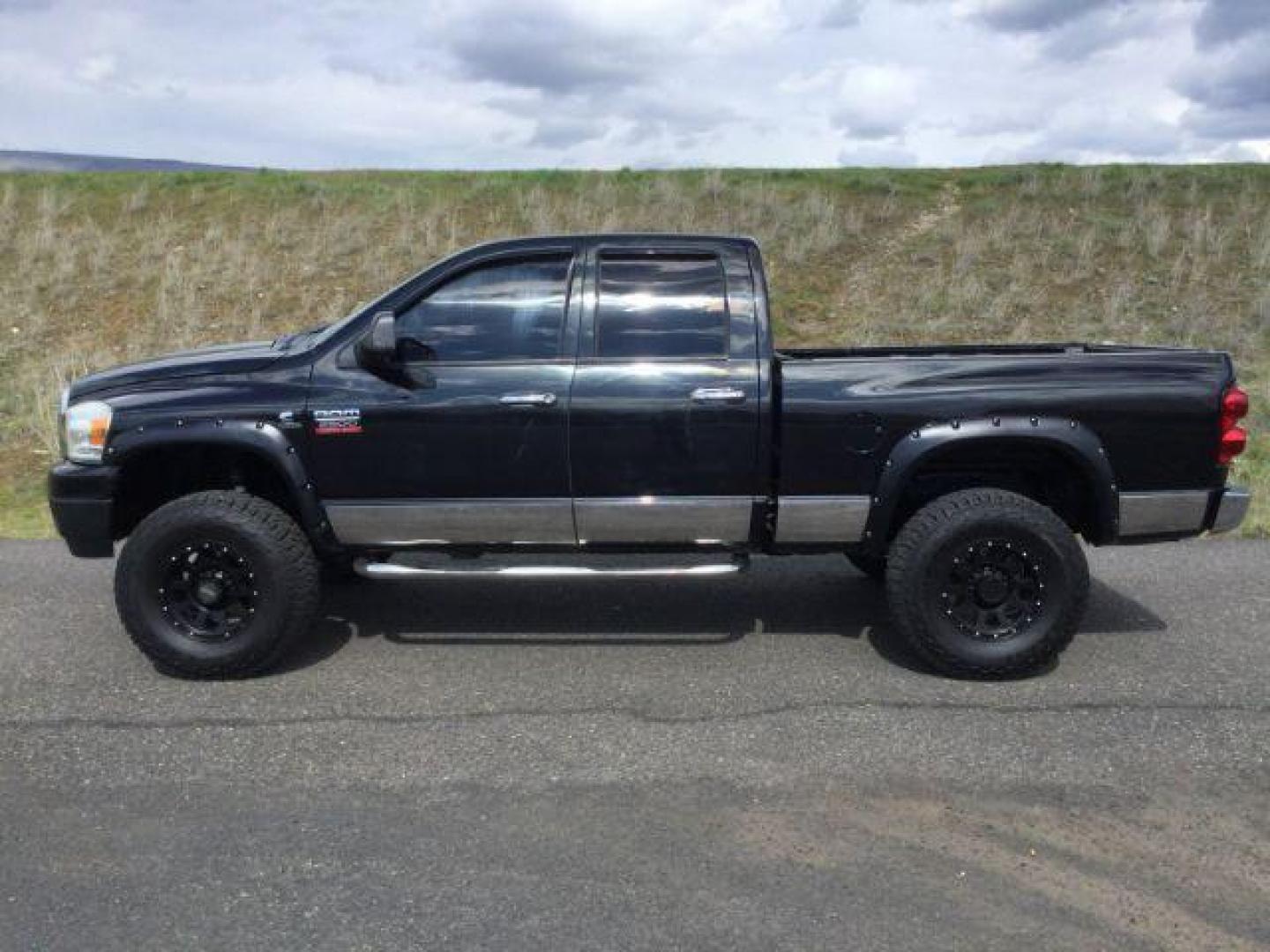 2008 BLACK /Gray Cloth RAM 2500 Quad Cab SXT (3D7KS28A68G) with an 6.7L I6 T-Diesel engine, automatic transmission, located at 1801 Main Street, Lewiston, 83501, (208) 743-9371, 46.417065, -117.004799 - Photo#1