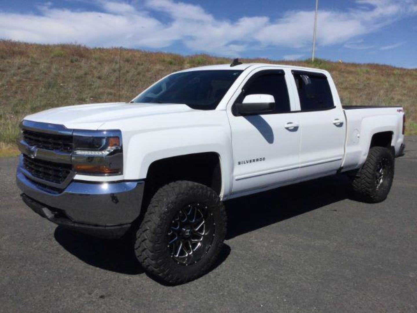 2018 Summit White /Jet Black, cloth Chevrolet Silverado 1500 LT Crew Cab Long Box 4WD (1GCUKREC1JF) with an 5.3L V8 OHV 16V engine, 6-Speed Automatic transmission, located at 1801 Main Street, Lewiston, 83501, (208) 743-9371, 46.417065, -117.004799 - Photo#0