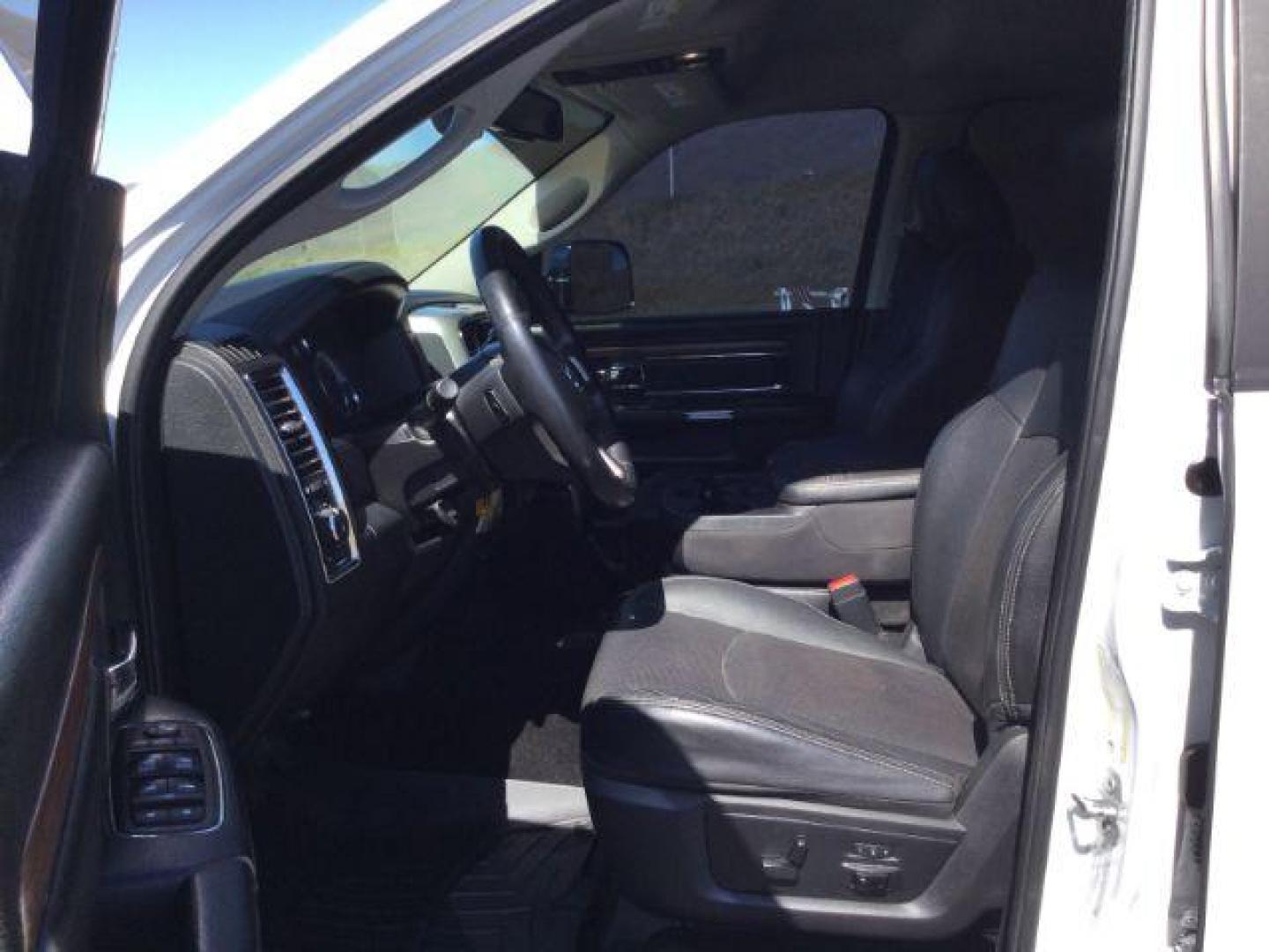 2016 Bright White Clear Coat/Bright Silver Metallic Cle /Black, leather RAM 2500 Laramie Crew Cab SWB 4WD (3C6UR5FL3GG) with an 6.7L L6 OHV 24V TURBO DIESEL engine, 6-Speed Automatic transmission, located at 1801 Main Street, Lewiston, 83501, (208) 743-9371, 46.417065, -117.004799 - Photo#4