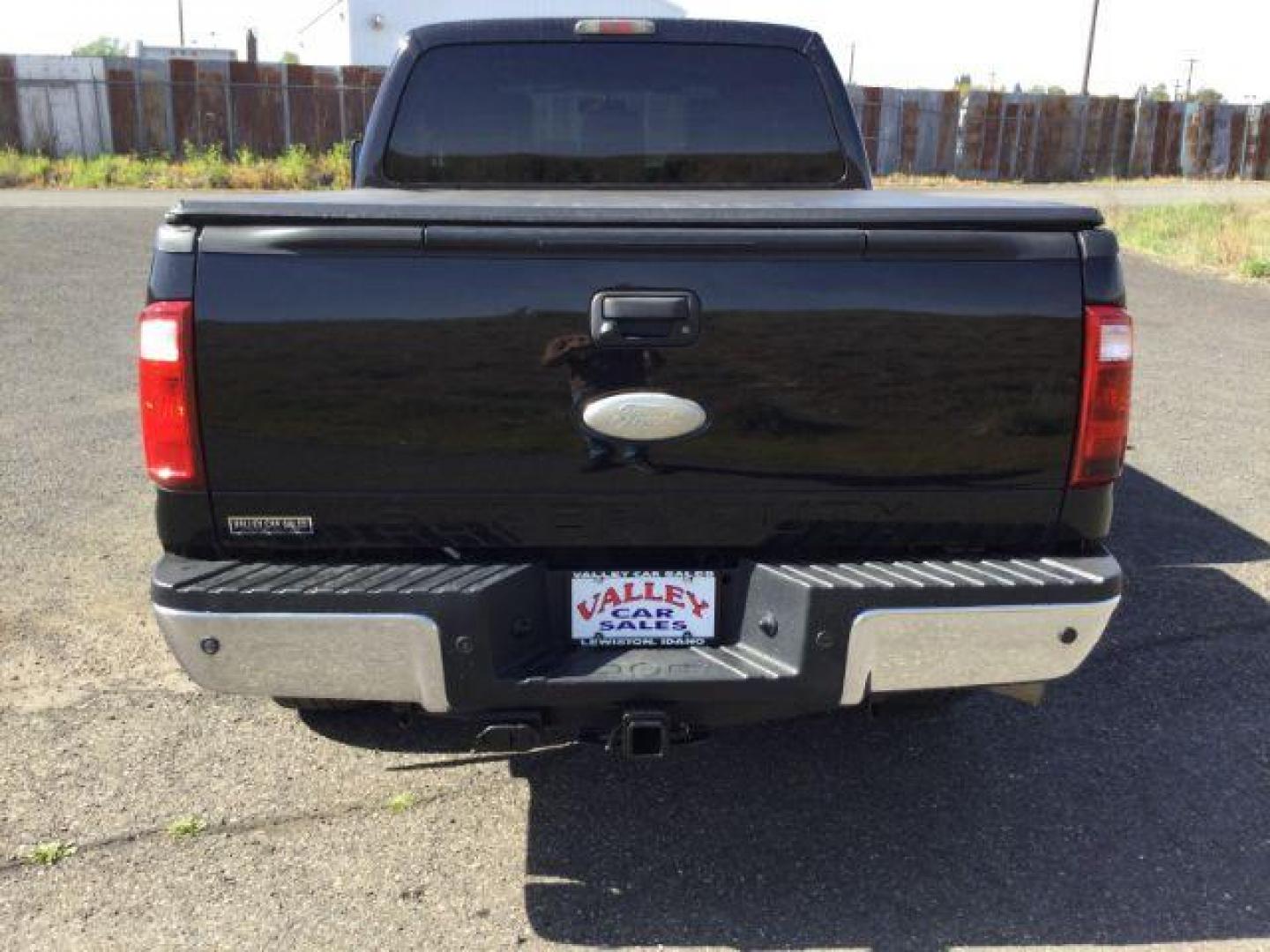 2012 Black /Black Leather Interior Ford F-350 SD Lariat Crew Cab 4WD (1FT8W3BT6CE) with an 6.7L V8 OHV 16V DIESEL engine, 6-Speed Automatic transmission, located at 1801 Main Street, Lewiston, 83501, (208) 743-9371, 46.417065, -117.004799 - Photo#15