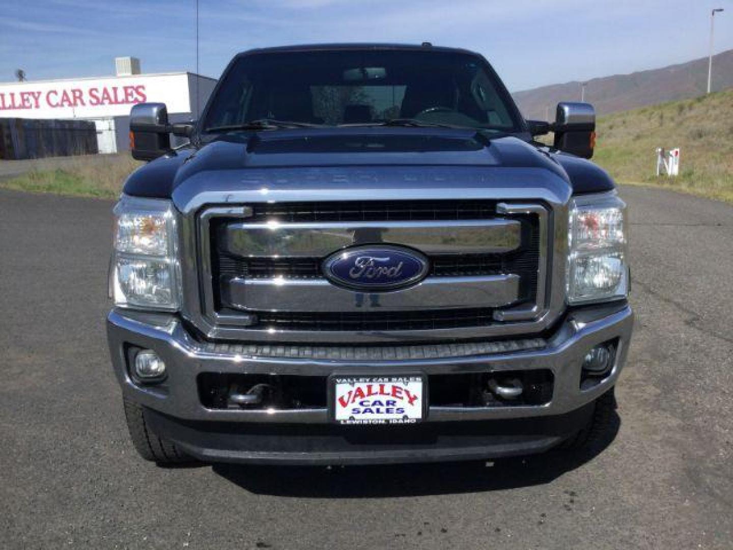 2012 Black /Black Leather Interior Ford F-350 SD Lariat Crew Cab 4WD (1FT8W3BT6CE) with an 6.7L V8 OHV 16V DIESEL engine, 6-Speed Automatic transmission, located at 1801 Main Street, Lewiston, 83501, (208) 743-9371, 46.417065, -117.004799 - Photo#7