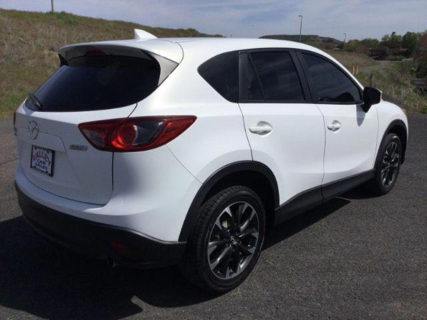 2016 White Platinum Metallic Mazda CX-5 SPORT UTILITY 4-DR (JM3KE4DY2G0) with an 2.5L L4 DOHC 16V engine, 6-Speed Automatic transmission, located at 1801 Main Street, Lewiston, 83501, (208) 743-9371, 46.417065, -117.004799 - Photo#10