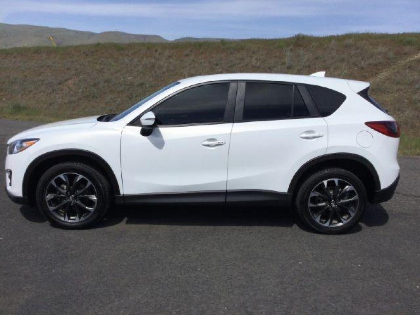 2016 White Platinum Metallic Mazda CX-5 SPORT UTILITY 4-DR (JM3KE4DY2G0) with an 2.5L L4 DOHC 16V engine, 6-Speed Automatic transmission, located at 1801 Main Street, Lewiston, 83501, (208) 743-9371, 46.417065, -117.004799 - Photo#1