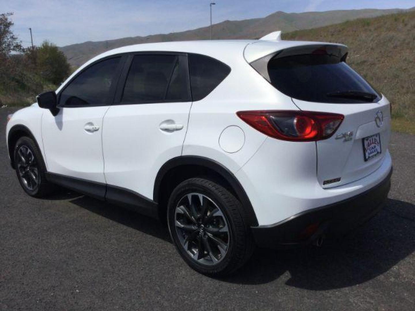 2016 White Platinum Metallic Mazda CX-5 SPORT UTILITY 4-DR (JM3KE4DY2G0) with an 2.5L L4 DOHC 16V engine, 6-Speed Automatic transmission, located at 1801 Main Street, Lewiston, 83501, (208) 743-9371, 46.417065, -117.004799 - Photo#2