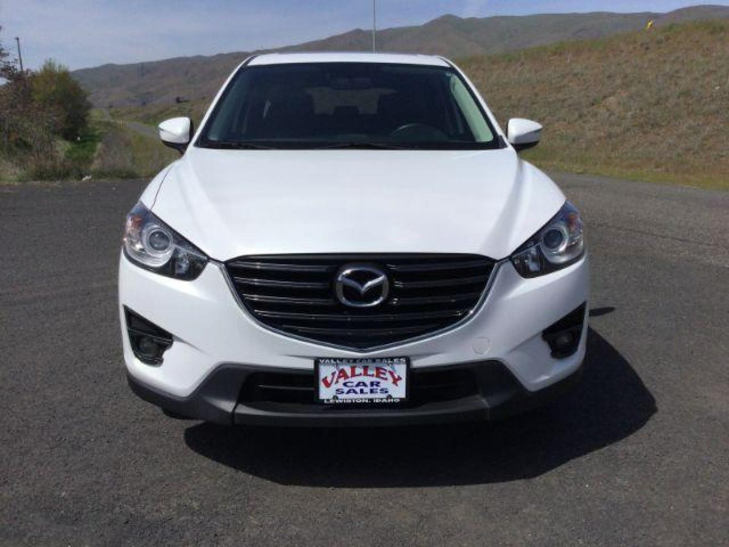 2016 White Platinum Metallic Mazda CX-5 SPORT UTILITY 4-DR (JM3KE4DY2G0) with an 2.5L L4 DOHC 16V engine, 6-Speed Automatic transmission, located at 1801 Main Street, Lewiston, 83501, (208) 743-9371, 46.417065, -117.004799 - Photo#7