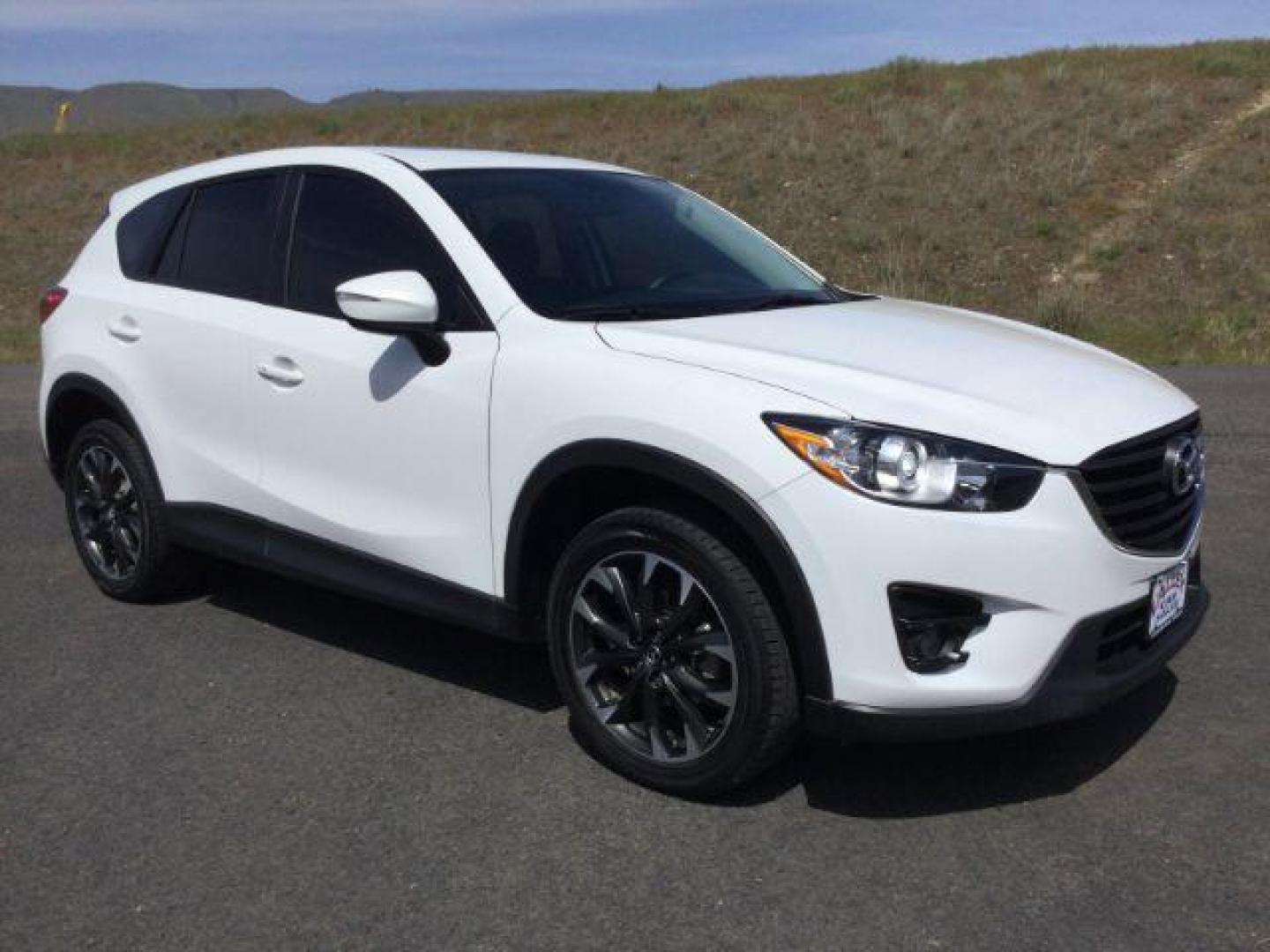 2016 White Platinum Metallic Mazda CX-5 SPORT UTILITY 4-DR (JM3KE4DY2G0) with an 2.5L L4 DOHC 16V engine, 6-Speed Automatic transmission, located at 1801 Main Street, Lewiston, 83501, (208) 743-9371, 46.417065, -117.004799 - Photo#8