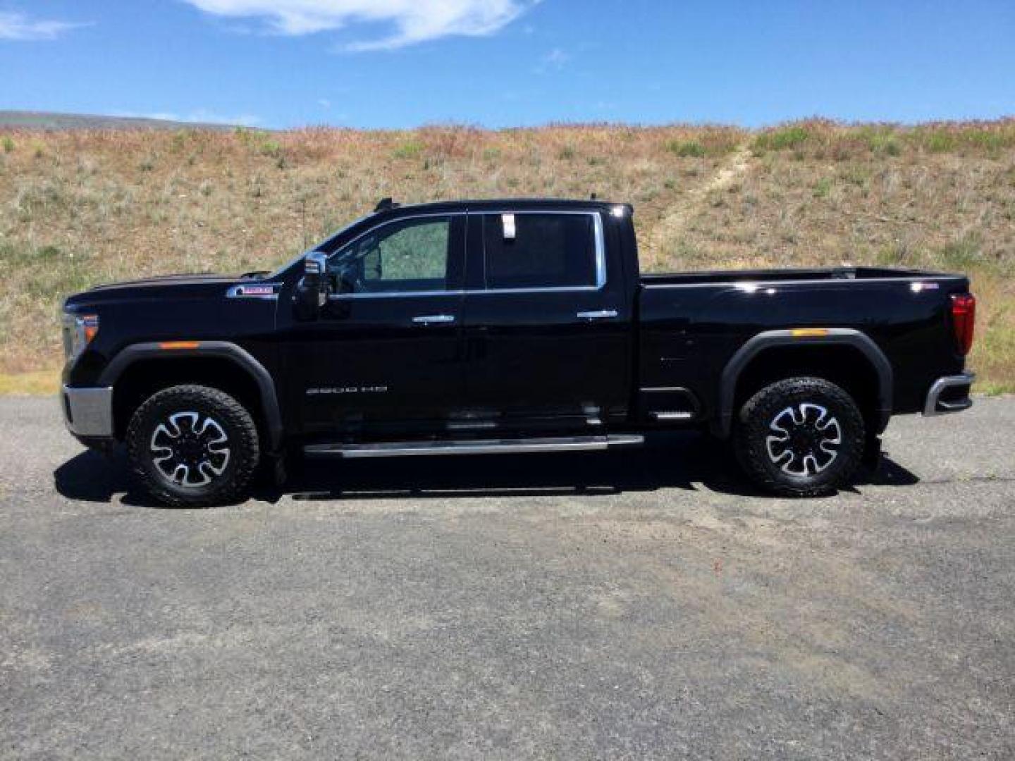 2020 Onyx Black /Jet Black, leather GMC Sierra 2500HD SLT Crew Cab 4WD (1GT49NEYXLF) with an 6.6L V8 OHV 16 DIESEL engine, 10 Speed Automatic transmission, located at 1801 Main Street, Lewiston, 83501, (208) 743-9371, 46.417065, -117.004799 - Photo#1