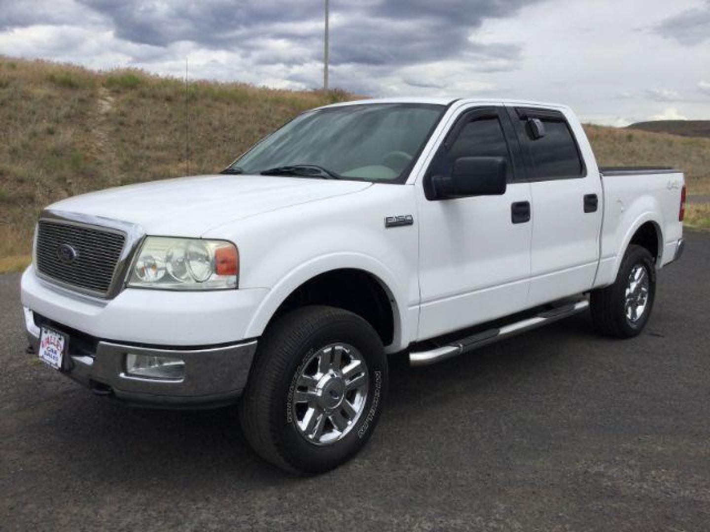 2004 Oxford White /Tan Leather Interior Ford F-150 Lariat SuperCrew 4WD (1FTPW14524K) with an 5.4L V8 SOHC 16V engine, 4-Speed Automatic transmission, located at 1801 Main Street, Lewiston, 83501, (208) 743-9371, 46.417065, -117.004799 - Photo#0