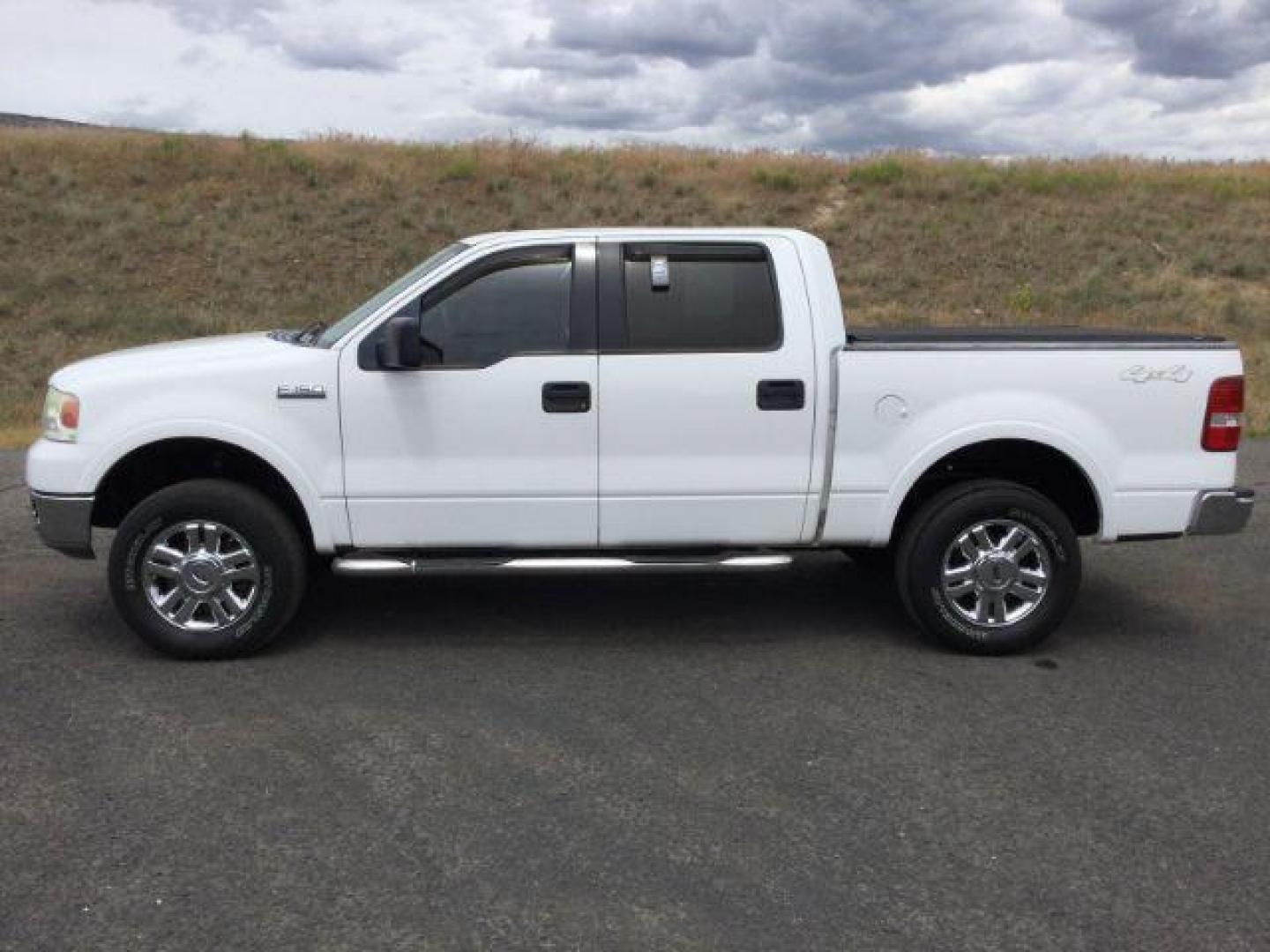 2004 Oxford White /Tan Leather Interior Ford F-150 Lariat SuperCrew 4WD (1FTPW14524K) with an 5.4L V8 SOHC 16V engine, 4-Speed Automatic transmission, located at 1801 Main Street, Lewiston, 83501, (208) 743-9371, 46.417065, -117.004799 - Photo#1