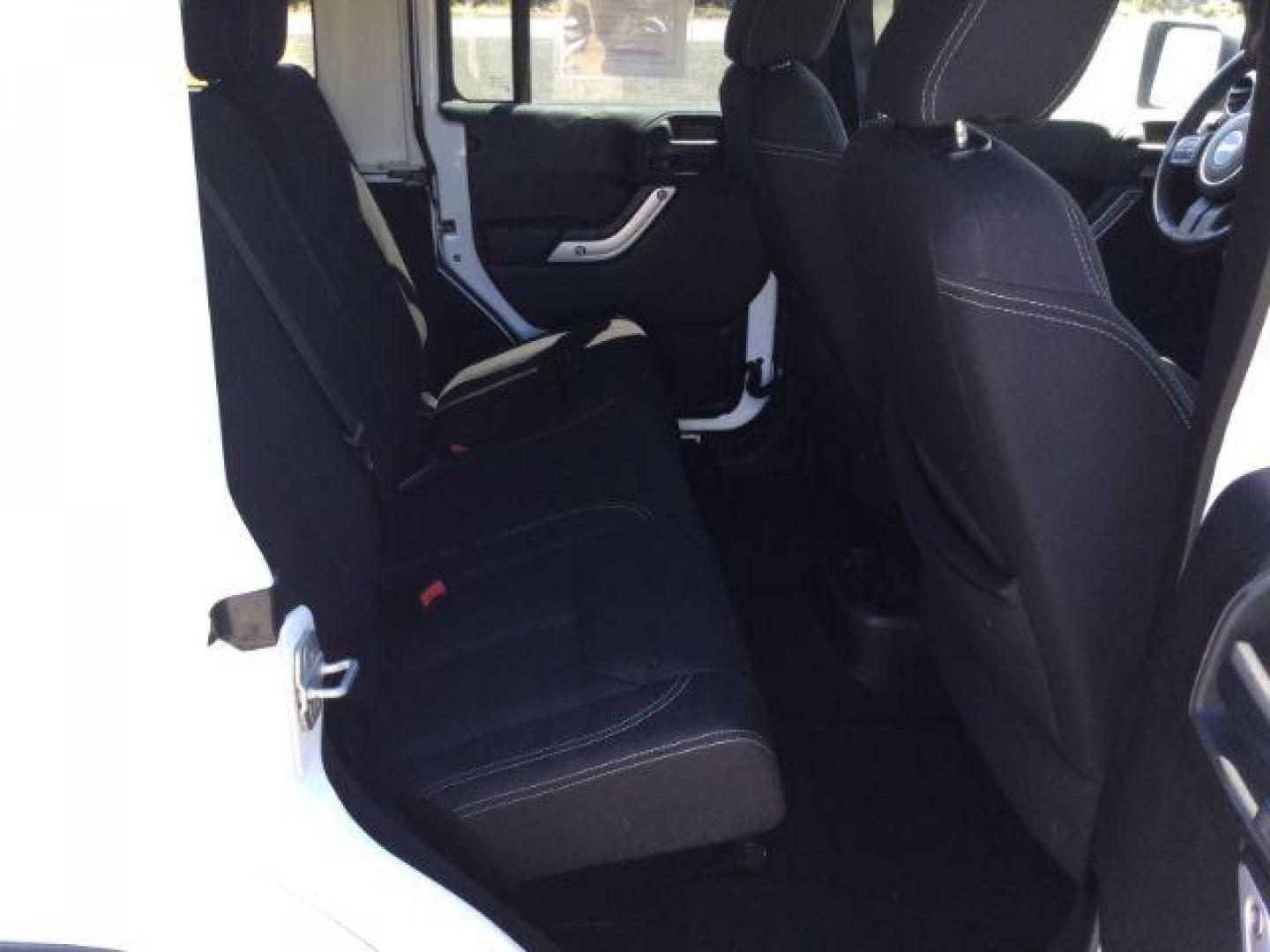 2013 Bright White /Black Cloth Interior Jeep Wrangler Unlimited Rubicon 4WD (1C4BJWFG6DL) with an 3.6L V6 DOHC 24V FFV engine, 5-Speed Automatic transmission, located at 1801 Main Street, Lewiston, 83501, (208) 743-9371, 46.417065, -117.004799 - Photo#11