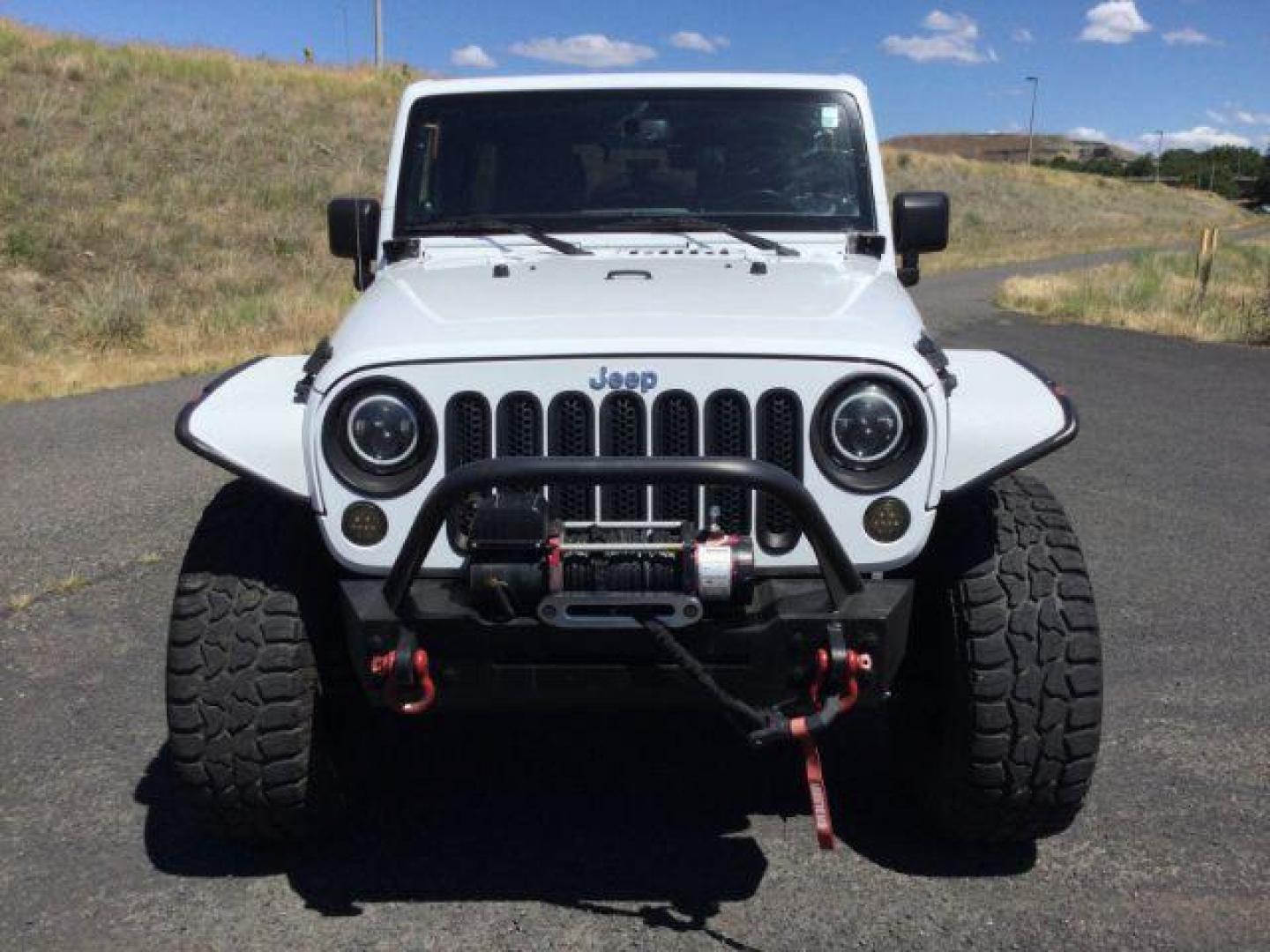 2013 Bright White /Black Cloth Interior Jeep Wrangler Unlimited Rubicon 4WD (1C4BJWFG6DL) with an 3.6L V6 DOHC 24V FFV engine, 5-Speed Automatic transmission, located at 1801 Main Street, Lewiston, 83501, (208) 743-9371, 46.417065, -117.004799 - Photo#14