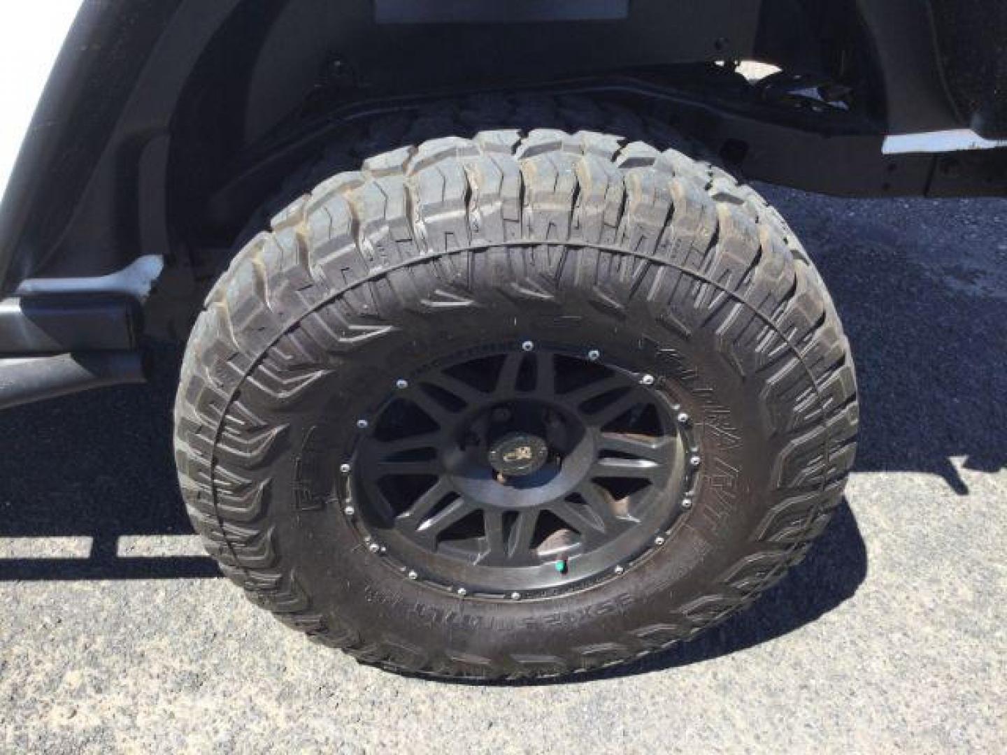 2013 Bright White /Black Cloth Interior Jeep Wrangler Unlimited Rubicon 4WD (1C4BJWFG6DL) with an 3.6L V6 DOHC 24V FFV engine, 5-Speed Automatic transmission, located at 1801 Main Street, Lewiston, 83501, (208) 743-9371, 46.417065, -117.004799 - Photo#15