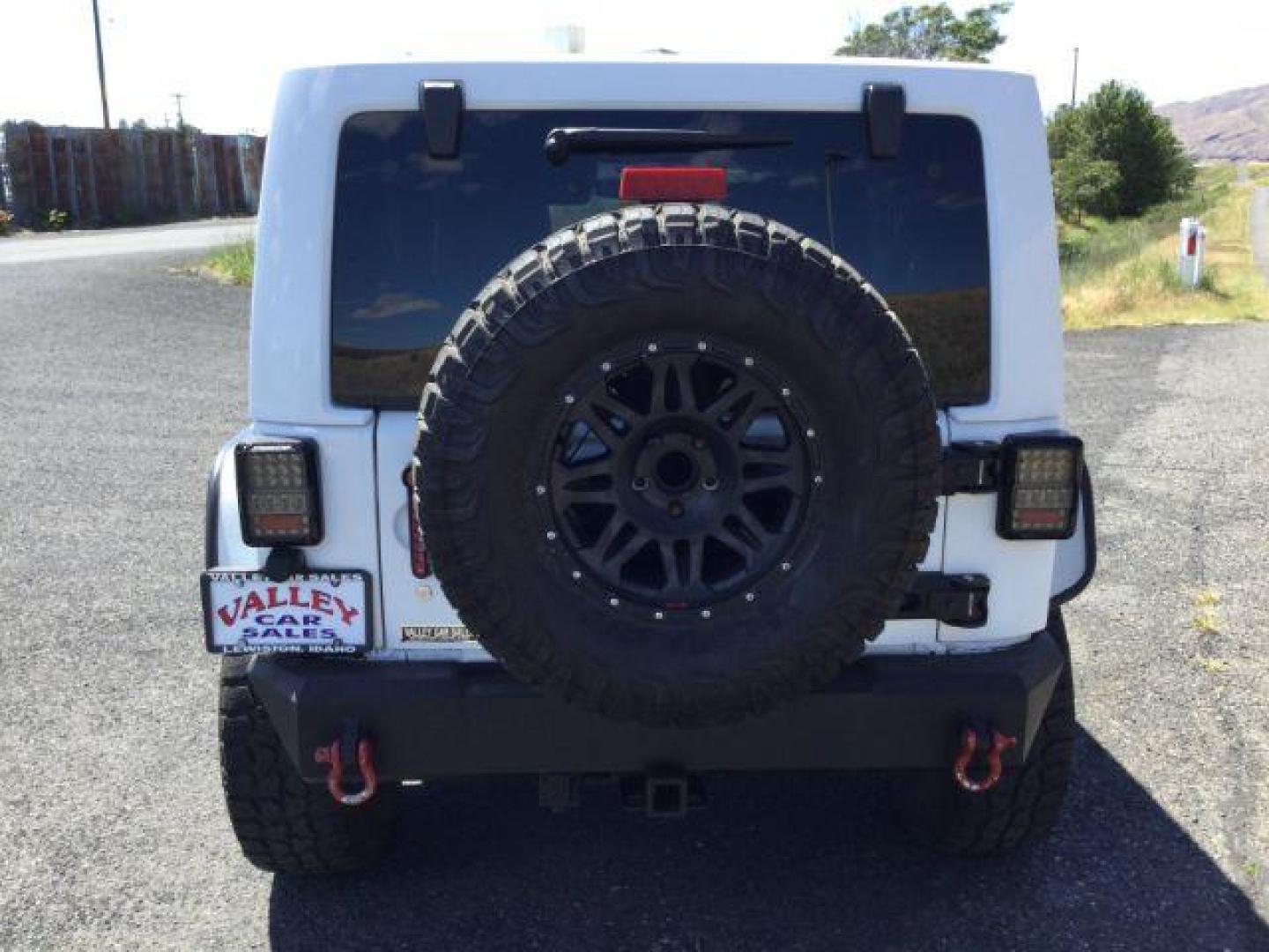 2013 Bright White /Black Cloth Interior Jeep Wrangler Unlimited Rubicon 4WD (1C4BJWFG6DL) with an 3.6L V6 DOHC 24V FFV engine, 5-Speed Automatic transmission, located at 1801 Main Street, Lewiston, 83501, (208) 743-9371, 46.417065, -117.004799 - Photo#7