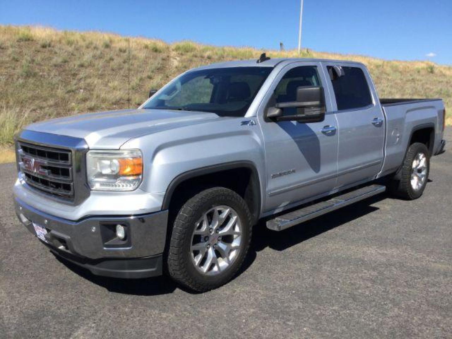 2015 Quicksilver Metallic /Jet Black, leather GMC Sierra 1500 SLT Crew Cab Long Box 4WD (3GTU2VECXFG) with an 5.3L V8 OHV 16V engine, 6-Speed Automatic transmission, located at 1801 Main Street, Lewiston, 83501, (208) 743-9371, 46.417065, -117.004799 - Photo#0